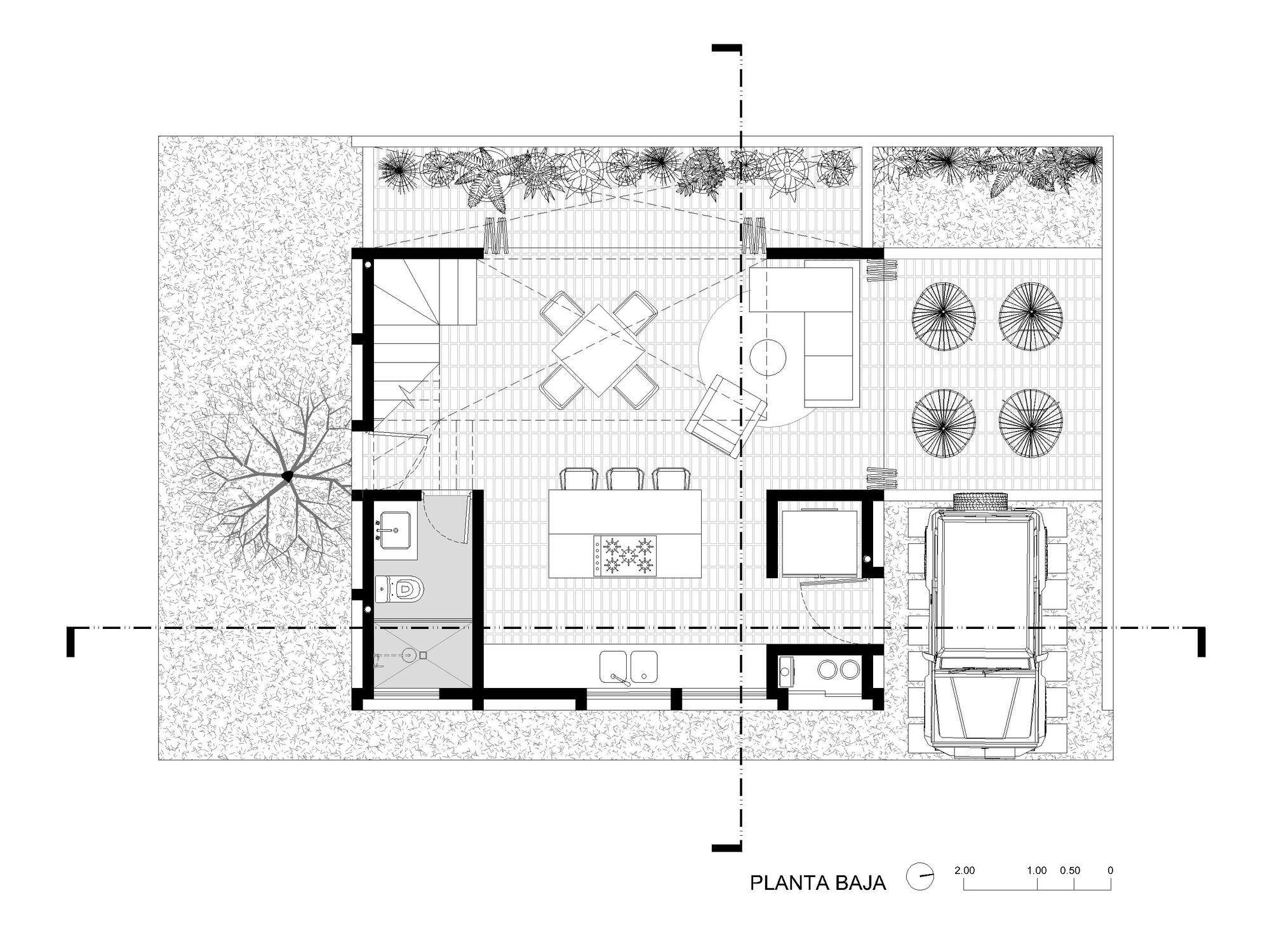 Ground floor plan showing open living and dining spaces with outdoor terrace and carport