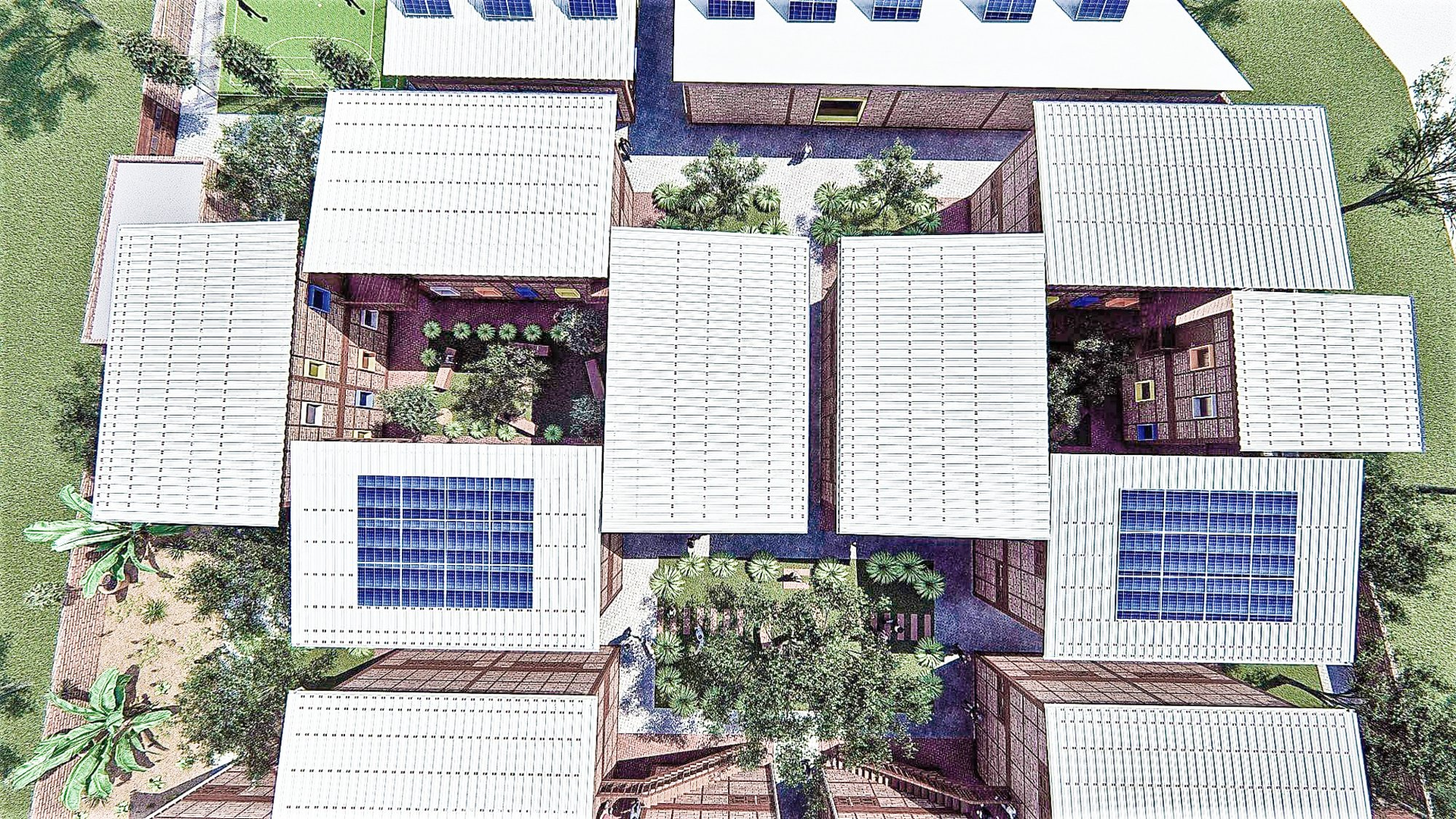 Aerial view of clustered refugee housing with solar roofs and shared courtyards.