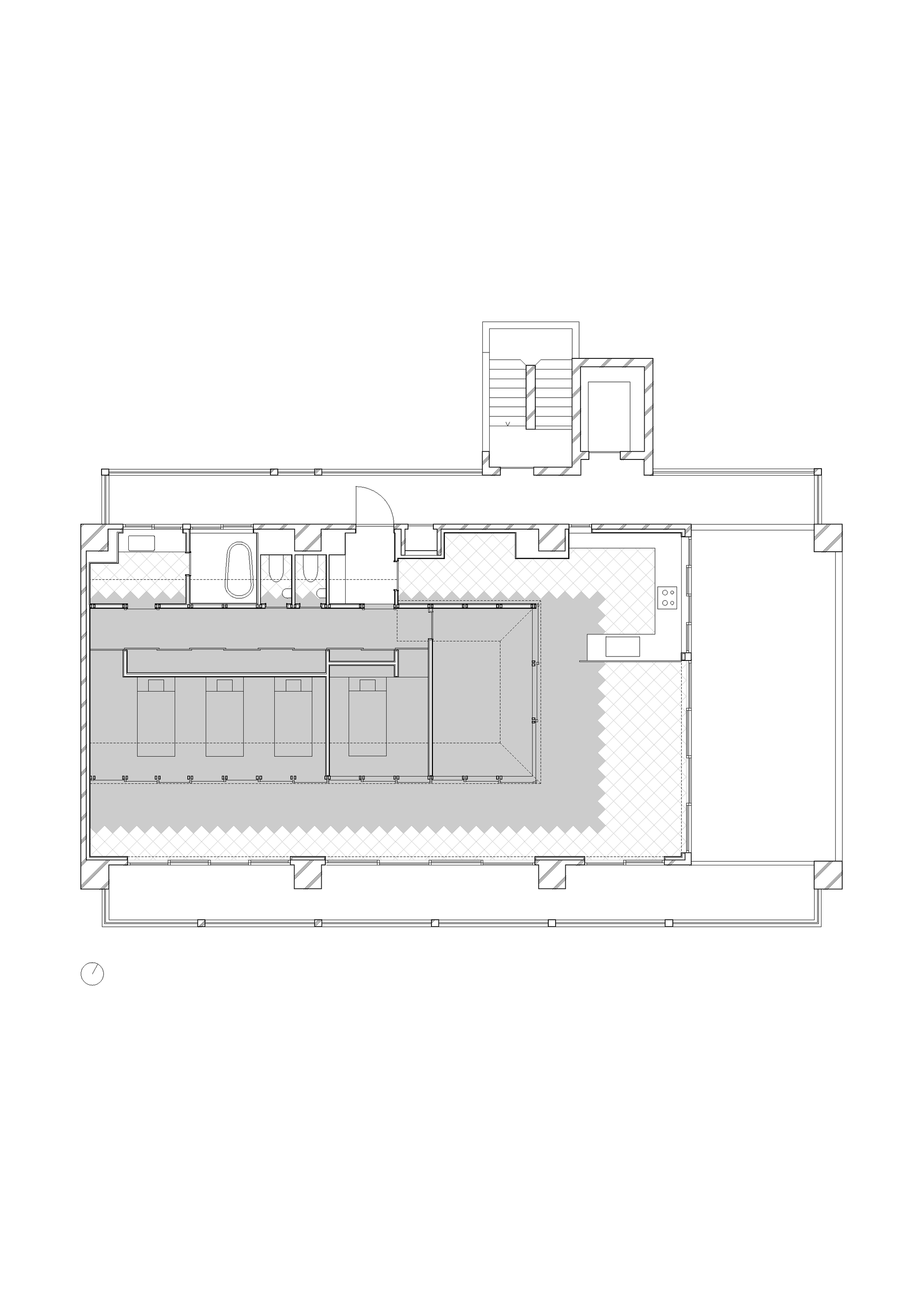 Floor plan drawing showing seating area with built-in banquettes and herringbone flooring pattern