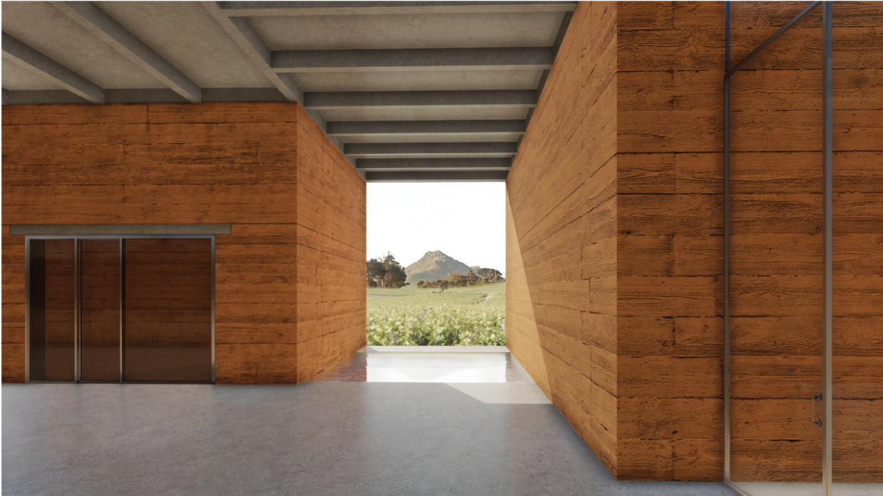 A narrow passage between massive earthen volumes carefully frames the vineyard and distant mountain landscape.