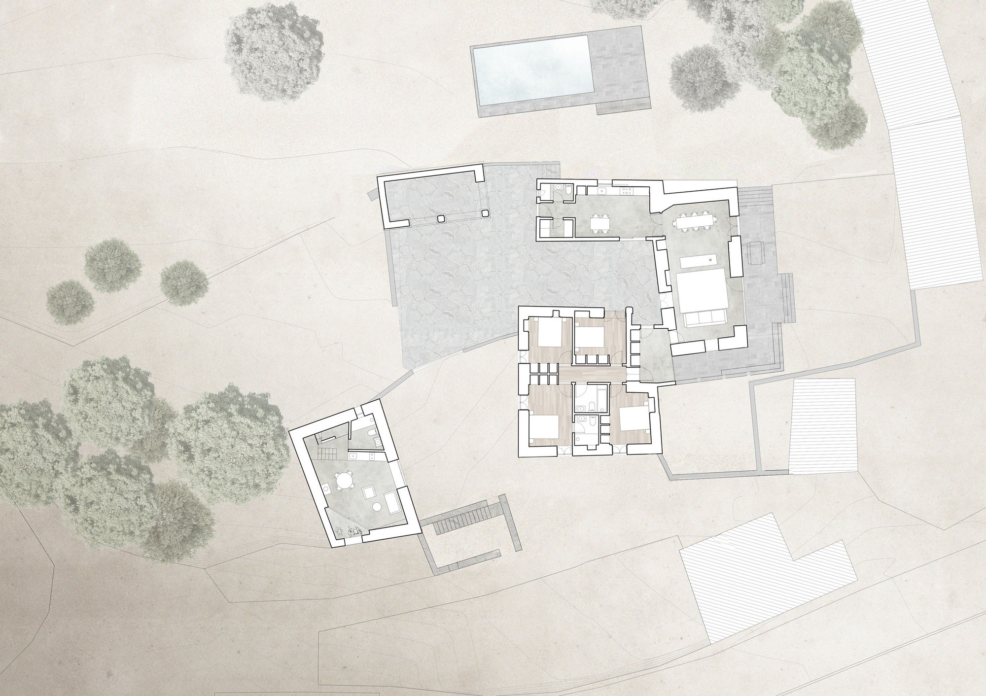 Floor plan drawing showing interior room layouts with adjacent landscape elements and adjacent structures