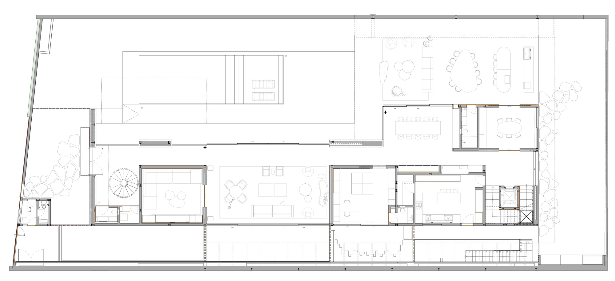 Floor plan drawing depicting a linear residence with central living area flanked by private rooms and garden courtyard