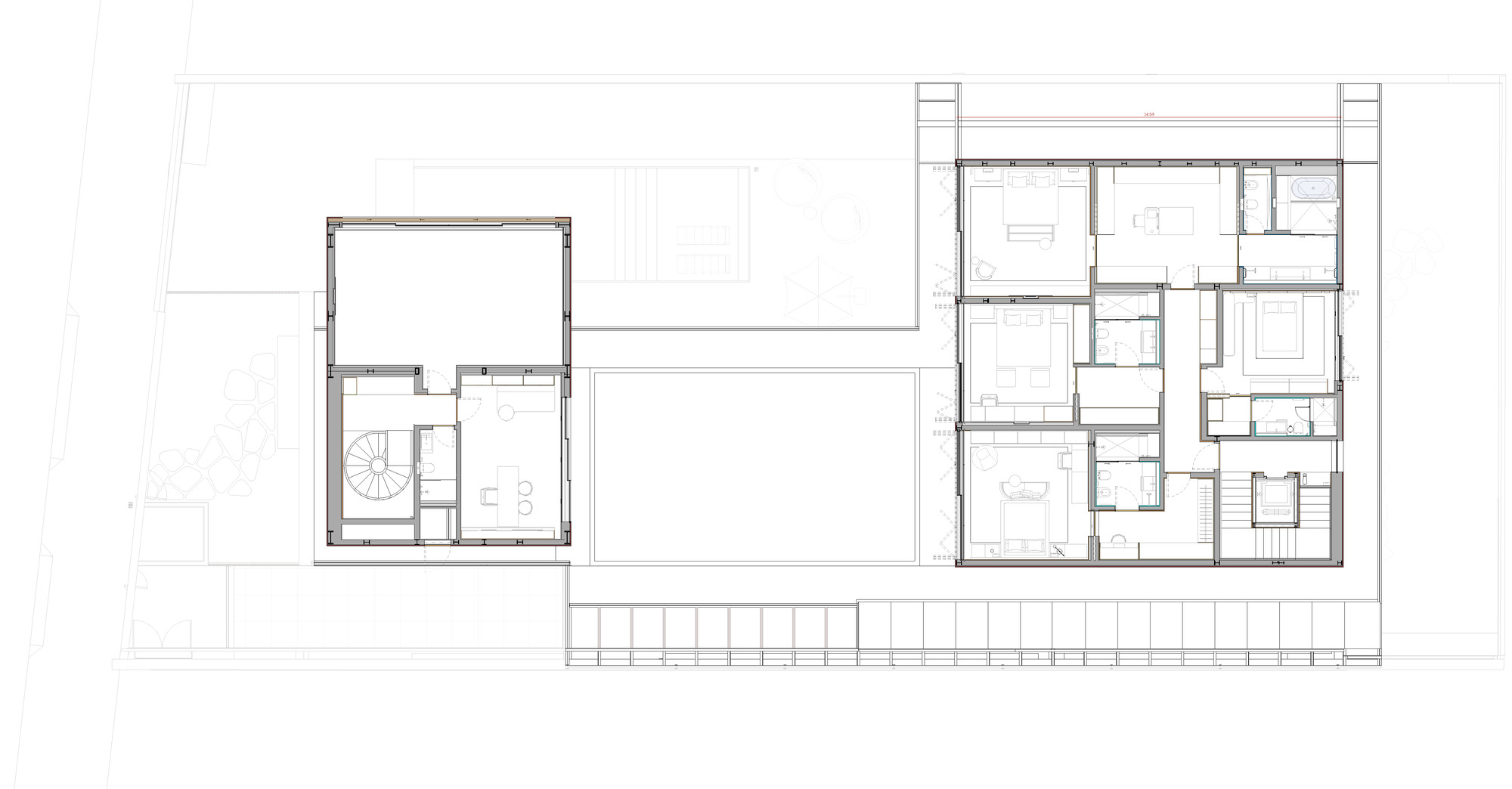 Floor plan drawing showing two distinct residential volumes separated by an open courtyard with stairs