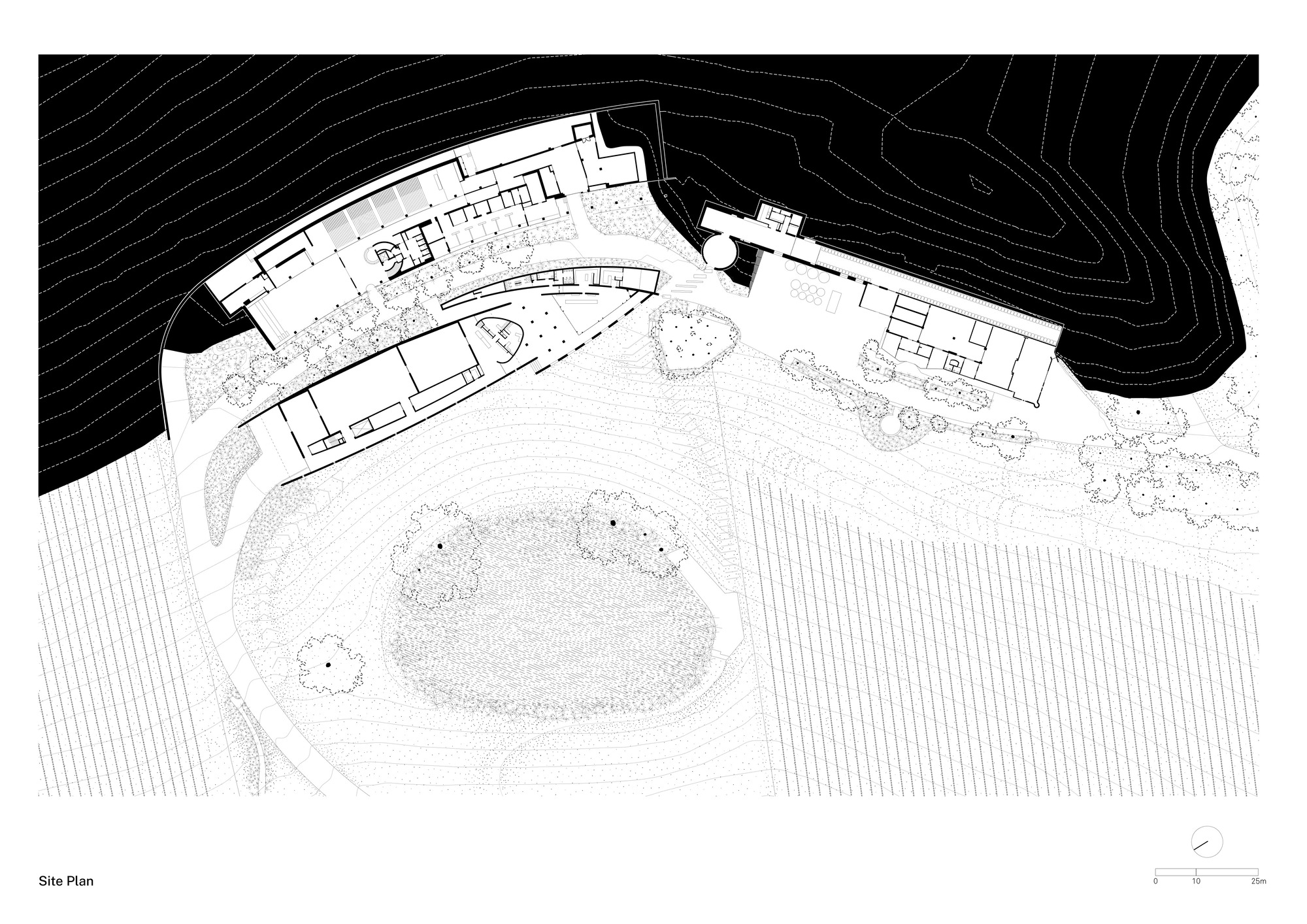 Site plan drawing showing a curved building with central courtyard nestled into contoured topography