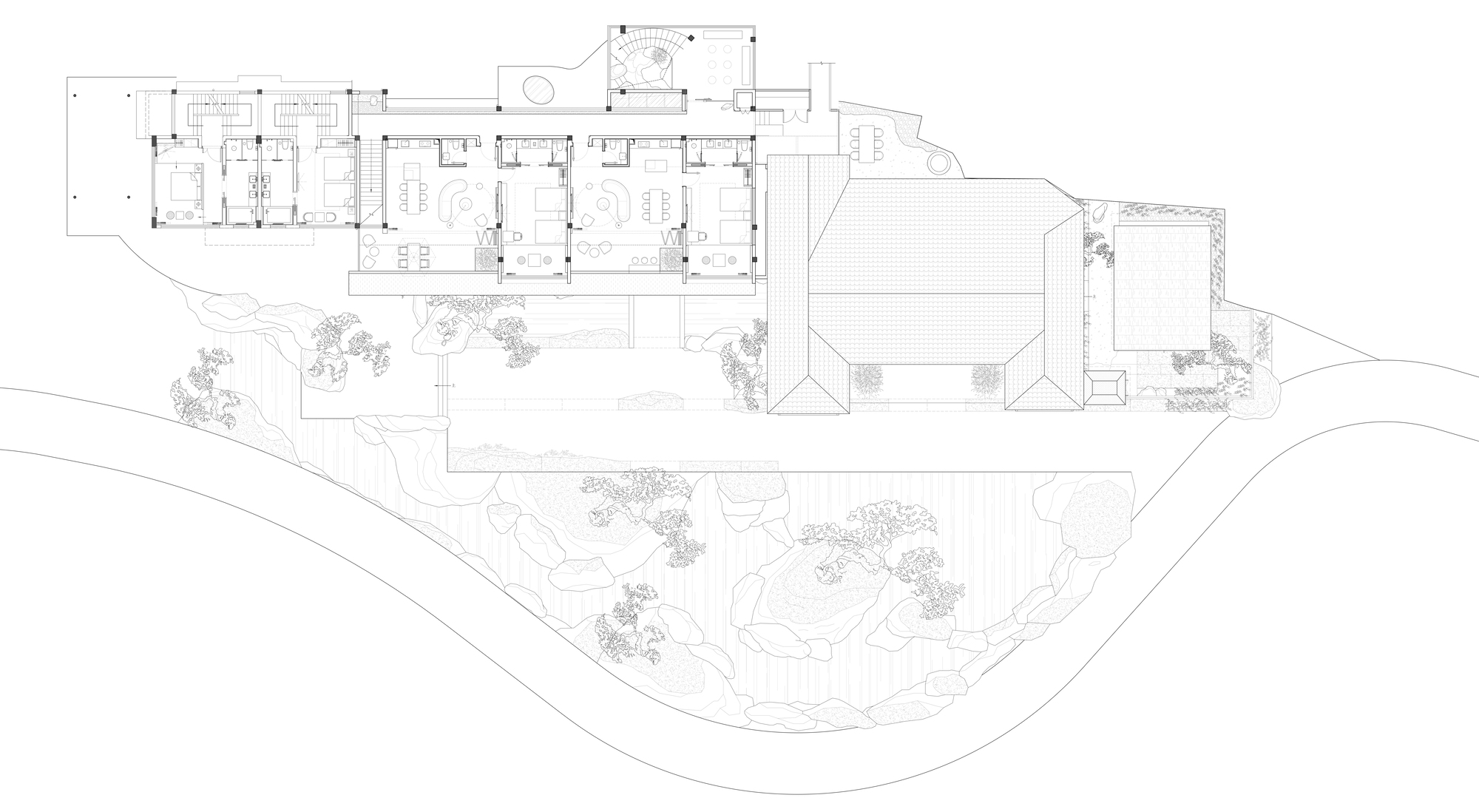 Floor plan drawing showing elongated building footprint with interior courtyards and surrounding hillside topography