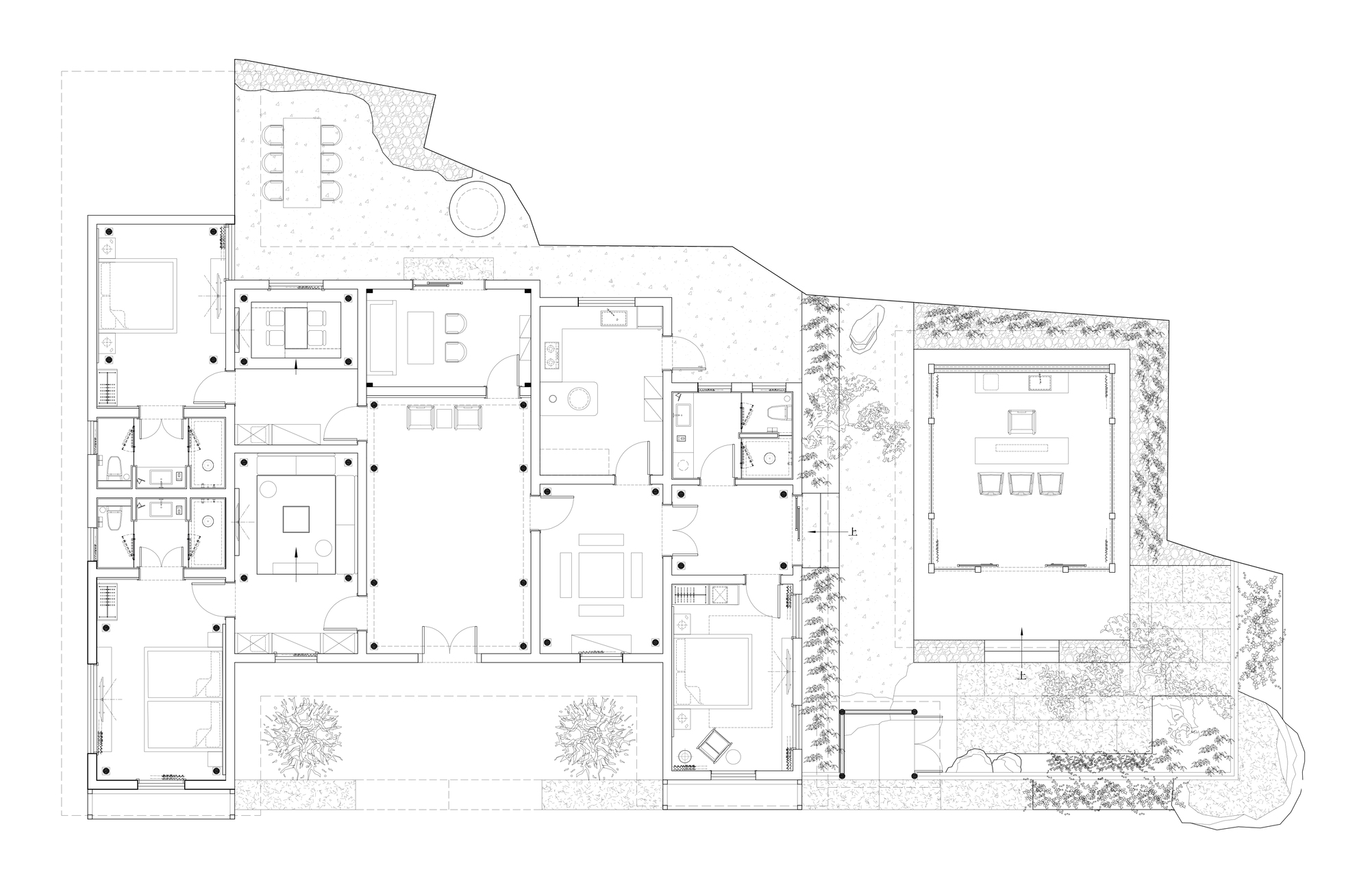 Floor plan drawing showing interconnected rooms arranged around interior courtyards with planted areas and terraces