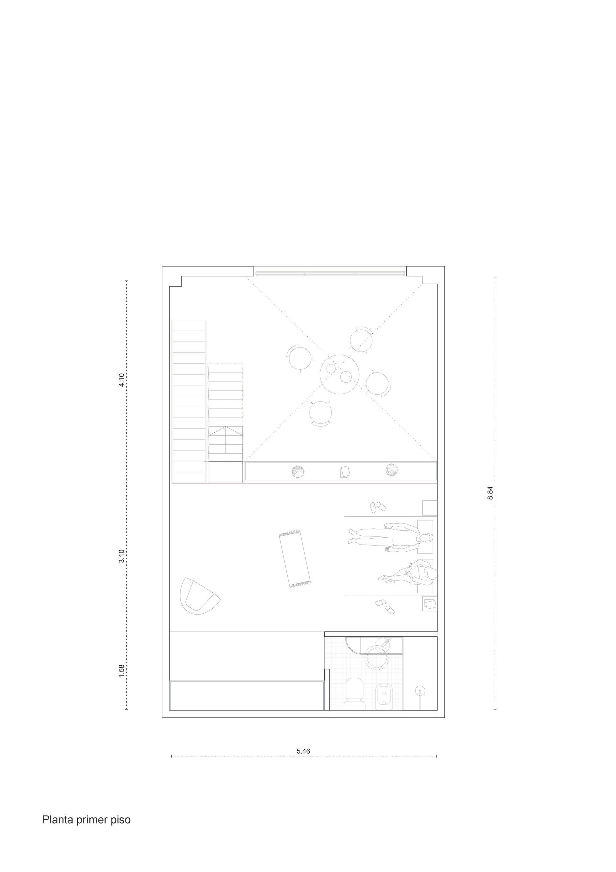 First floor plan drawing showing staircase, seating area, bedroom and bathroom spaces