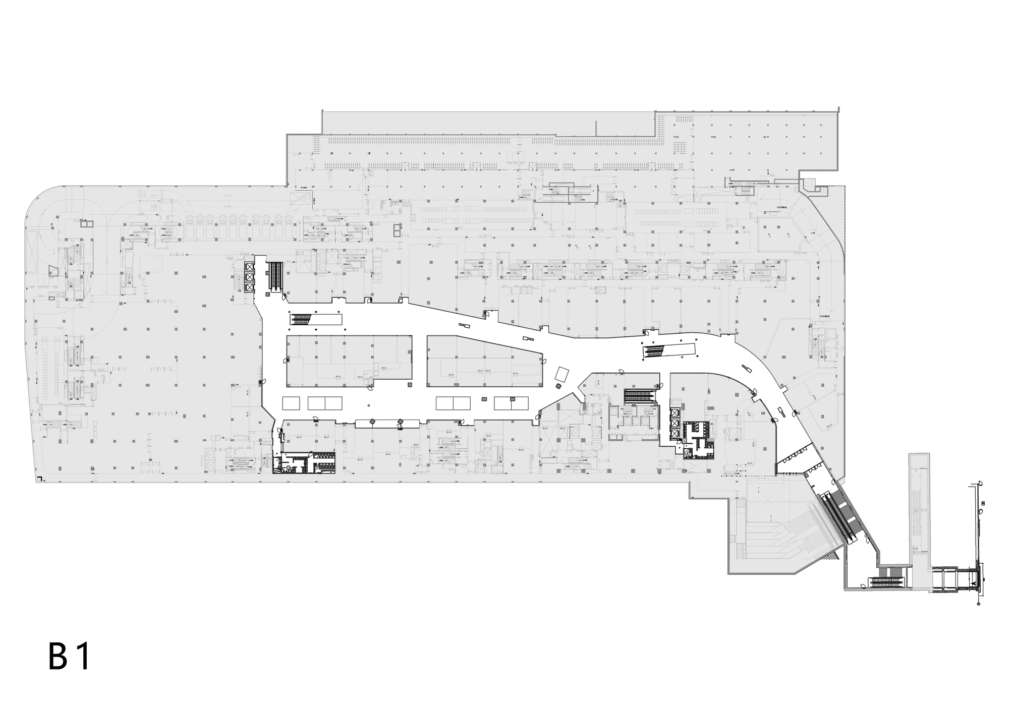 Floor plan drawing showing an irregular perimeter with curved interior circulation and scattered columns