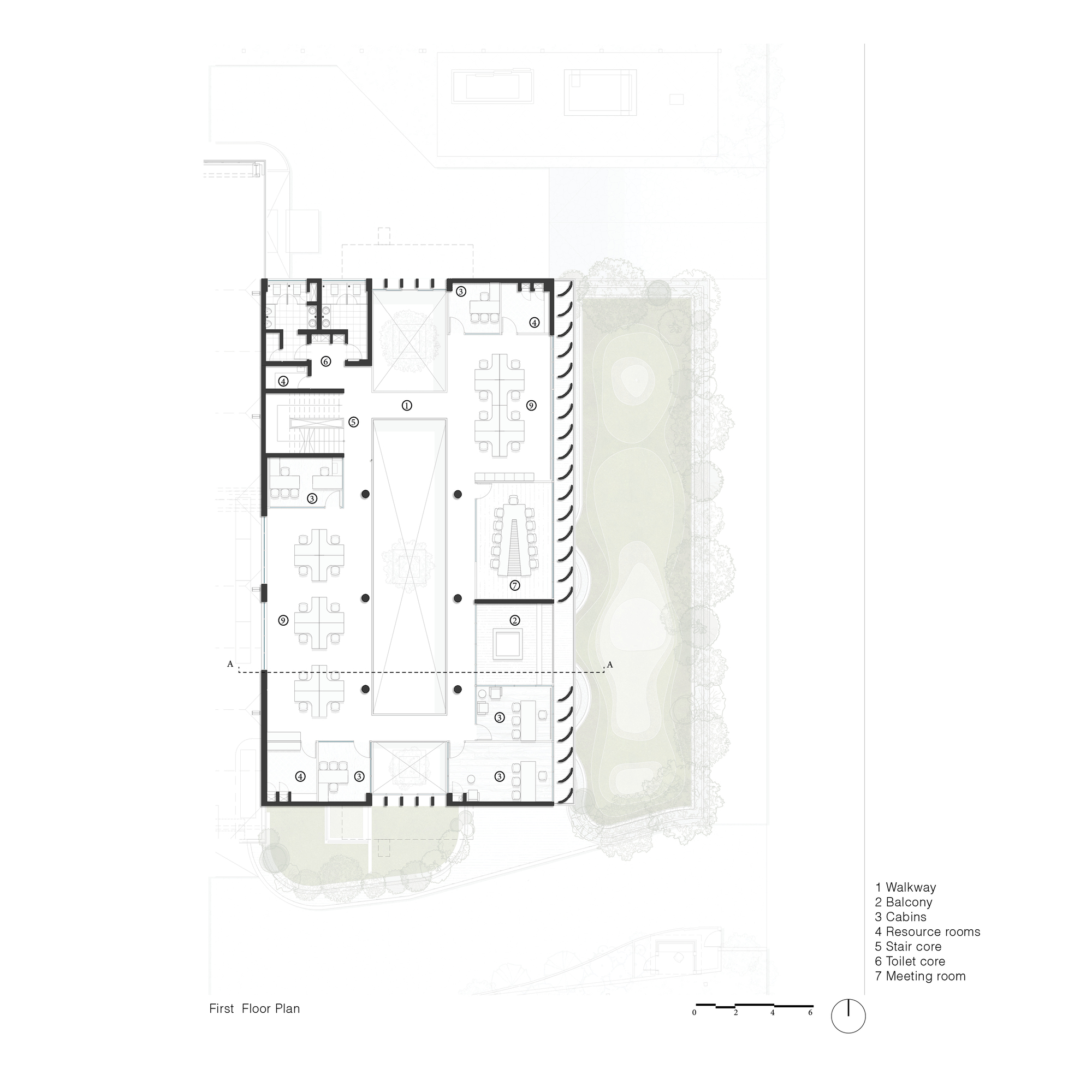First floor plan showing walkway and workspaces wrapping around an open atrium void