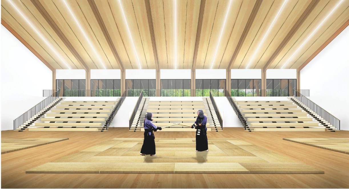 Multi-purpose dojo hall with timber ceiling, bleachers, and flexible martial arts practice zones.