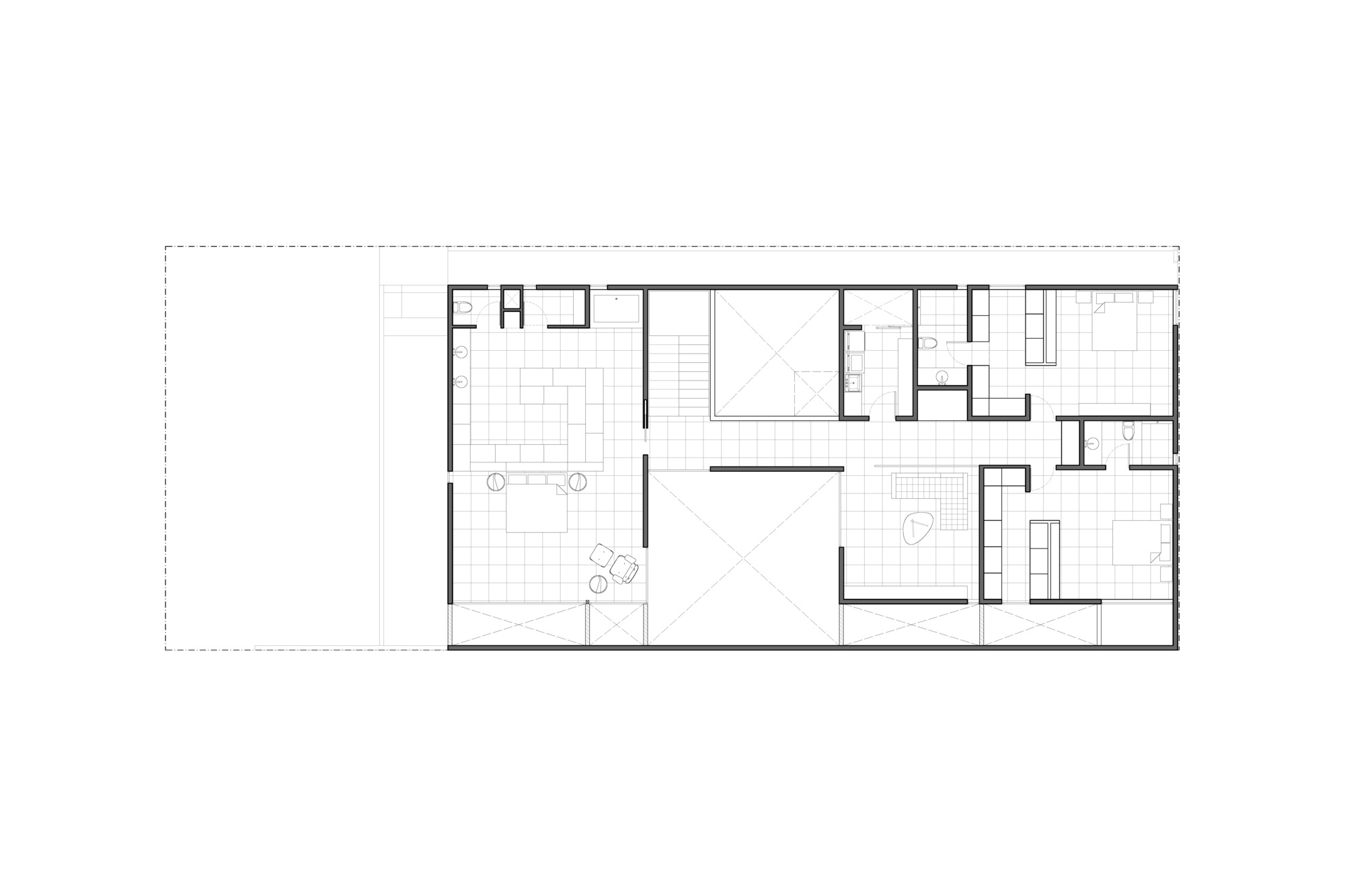 Upper floor plan drawing showing bedrooms, bathrooms and a stair landing arranged around two open voids and a terrace edge