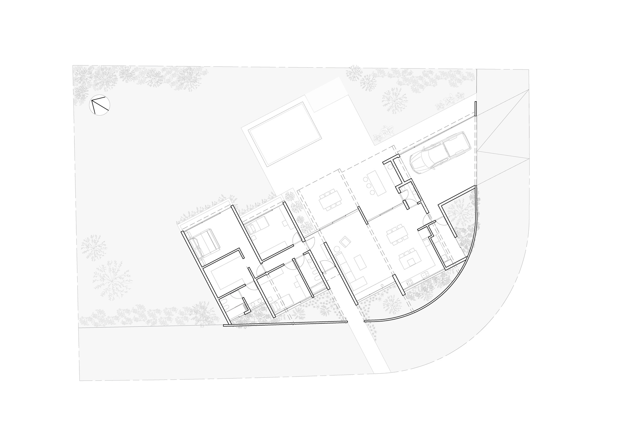 Floor plan drawing showing the angled layout of rooms with a curved exterior wall and pool