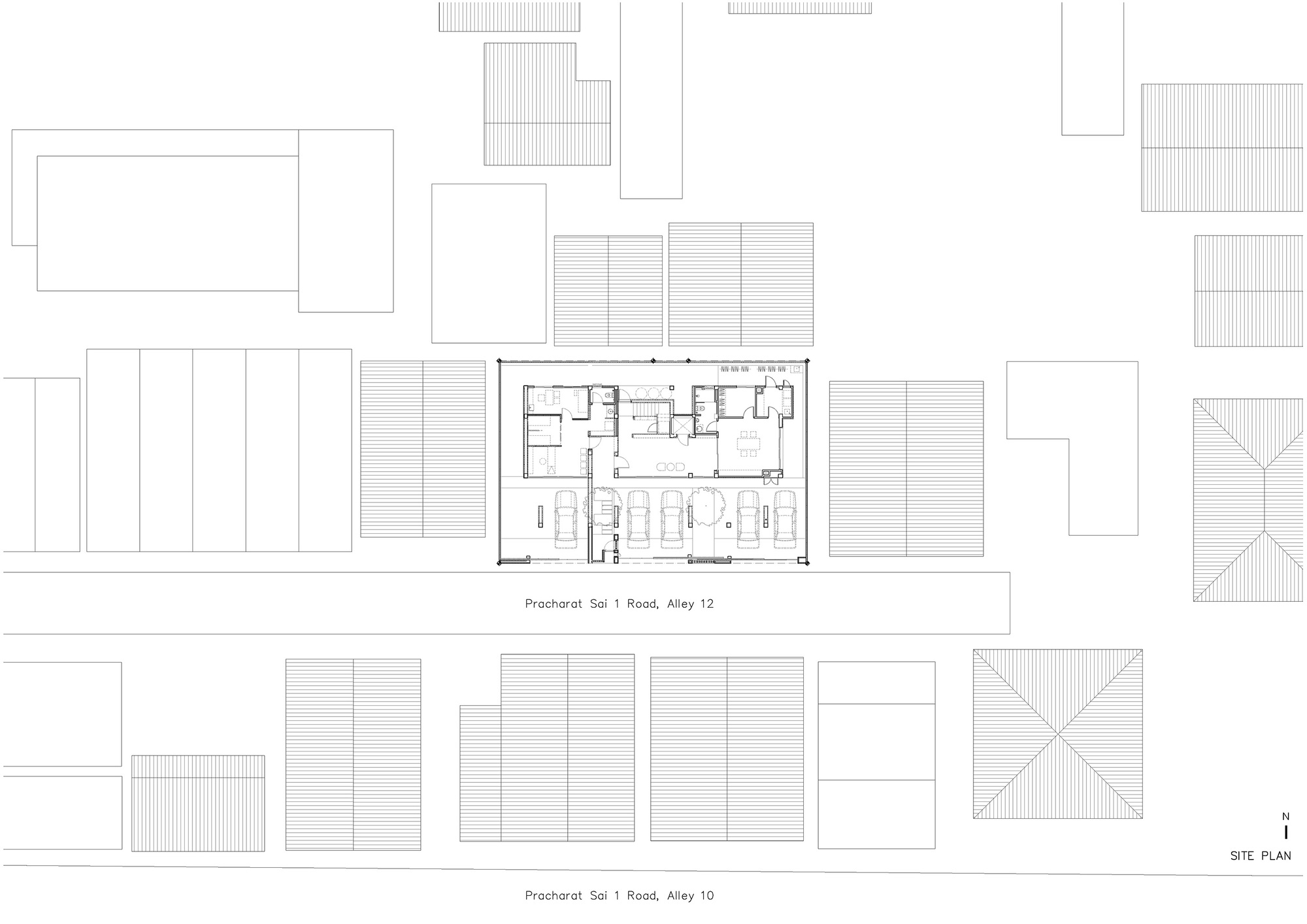 Site plan drawing showing the building footprint within the surrounding neighborhood context and adjacent structures