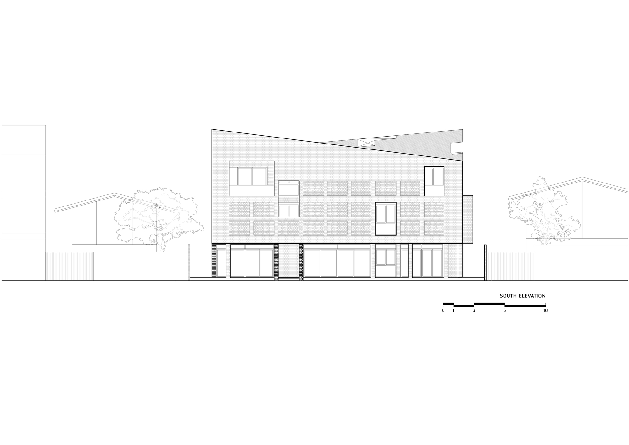 South elevation drawing depicting a grid facade with ground-floor glazing and sloped roof