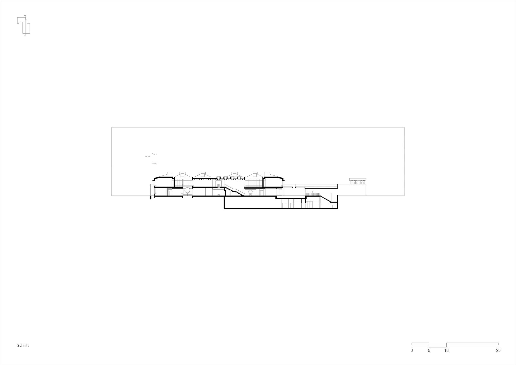 Section drawing revealing multiple floor levels with stepped volumes and a central atrium space
