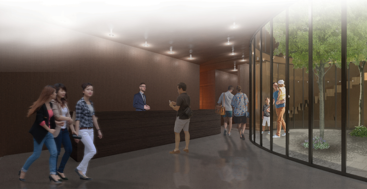A warm, contemporary lobby opens toward a landscaped courtyard, strengthening the connection between interior space and nature