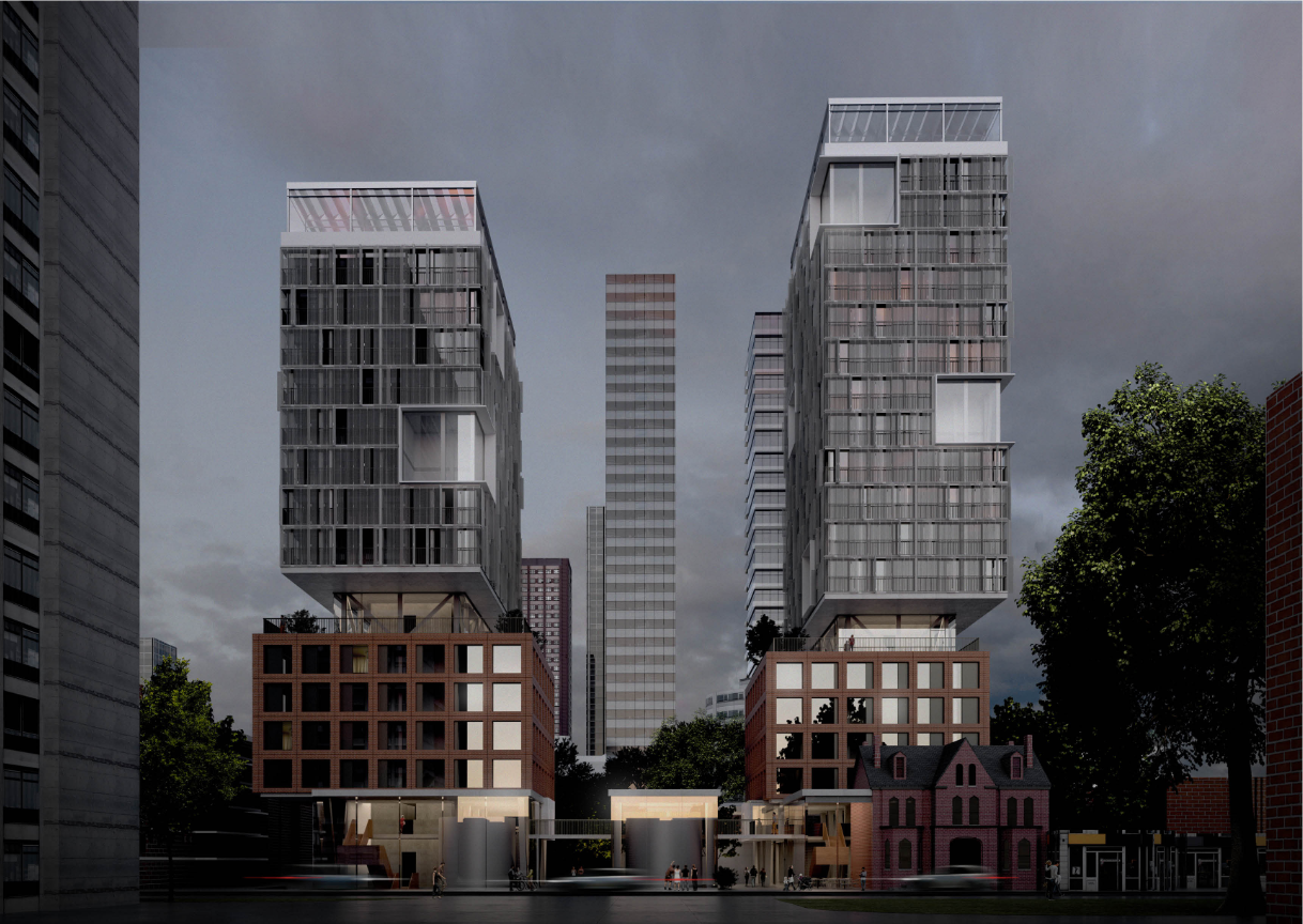 Evening view of the twin housing volumes, podium blocks, heritage structure, and illuminated communal ground plane.