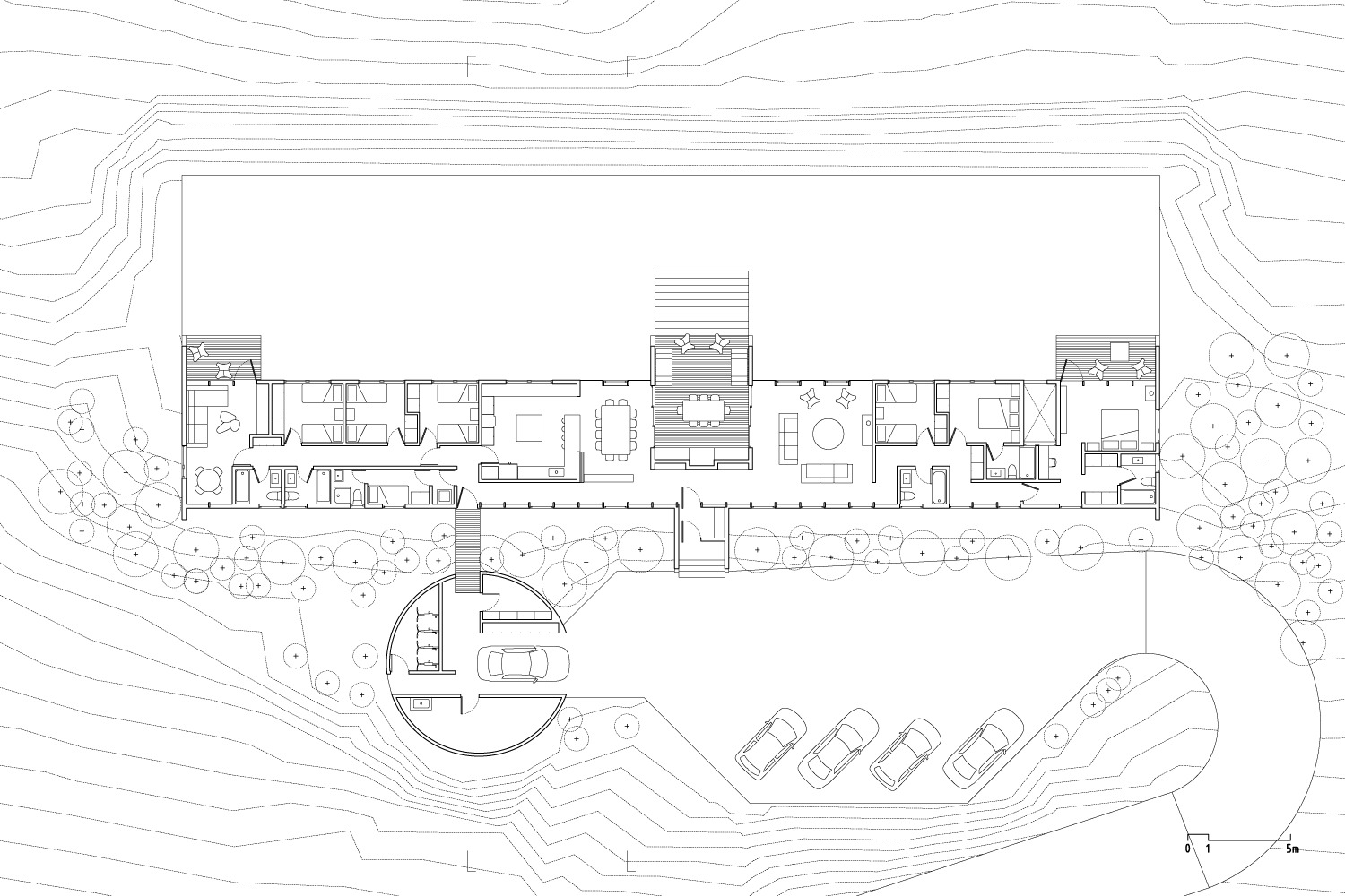 Site plan drawing showing the linear building footprint with curved parking area and surrounding topography