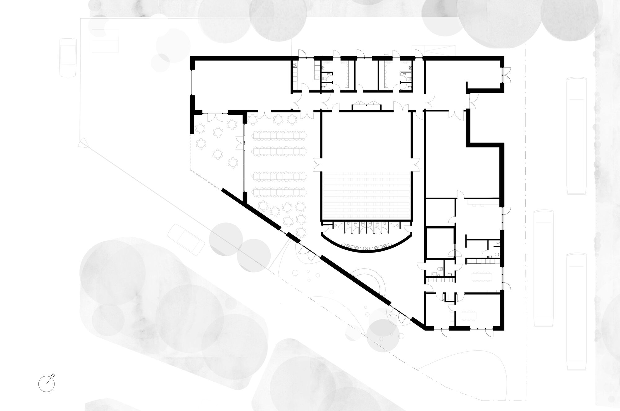 Floor plan drawing showing an angular volume with central hall, surrounding rooms, and semicircular stair