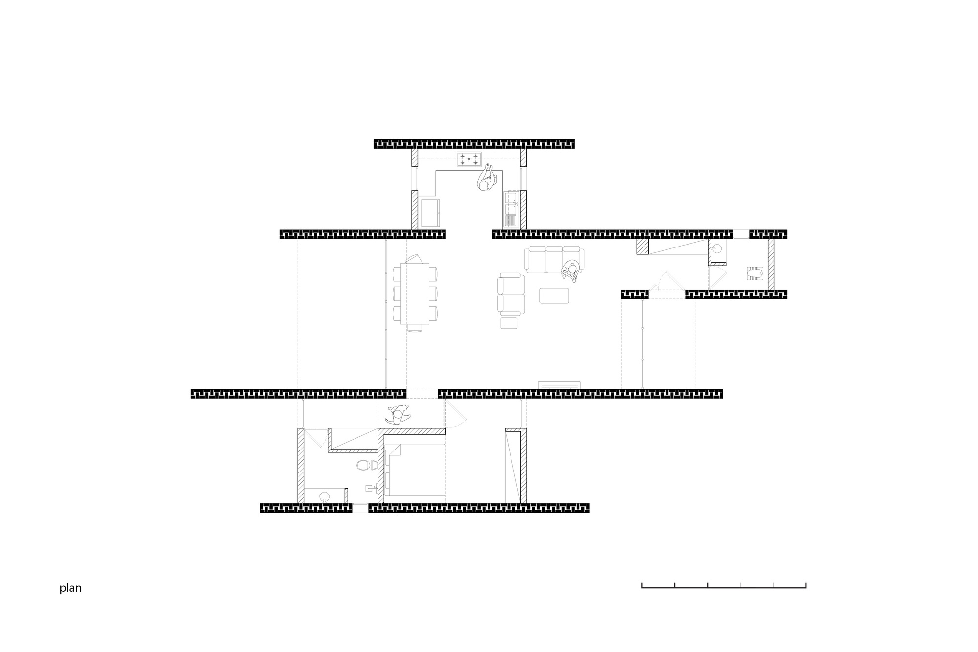 Floor plan drawing showing interconnected rectangular spaces with furniture layouts and openings