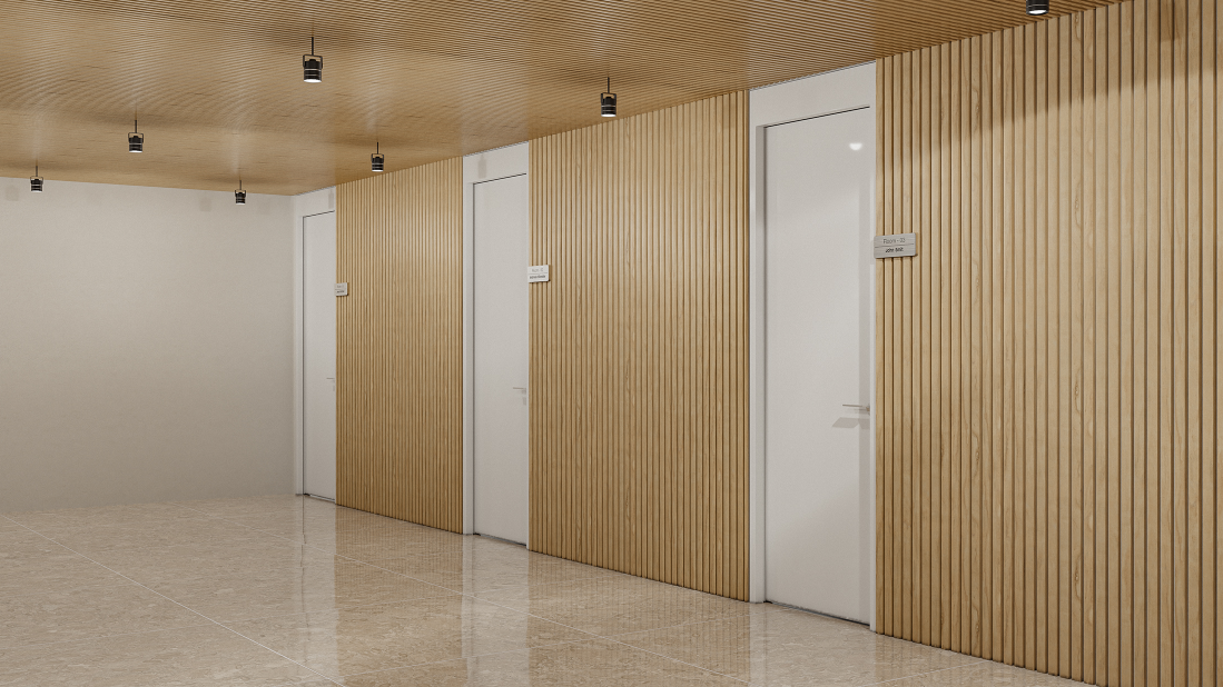 Warm timber-lined corridors create a calm, welcoming transition between private rooms and shared support spaces.