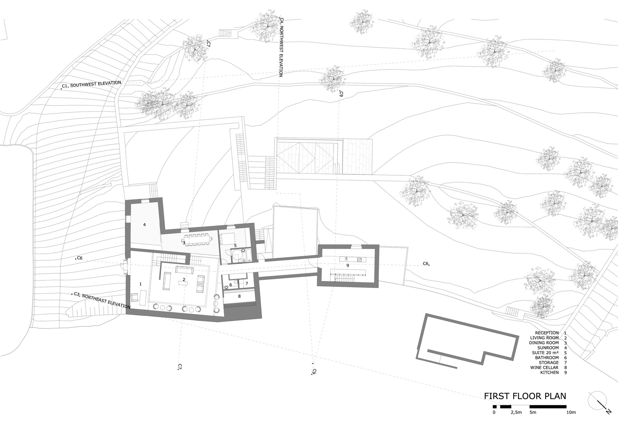 First floor plan showing interconnected volumes with living spaces spanning the hillside topography