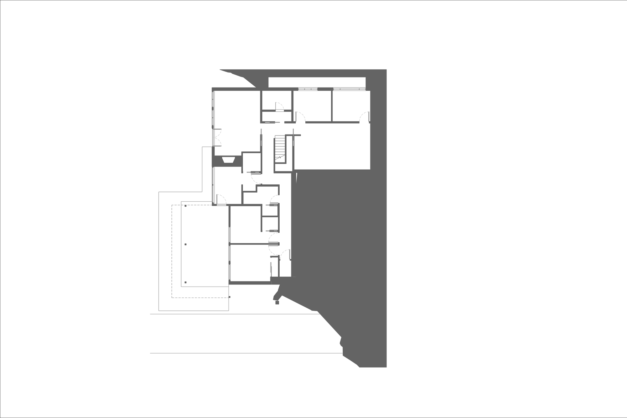 Floor plan drawing showing lower level adjacent to sloped terrain