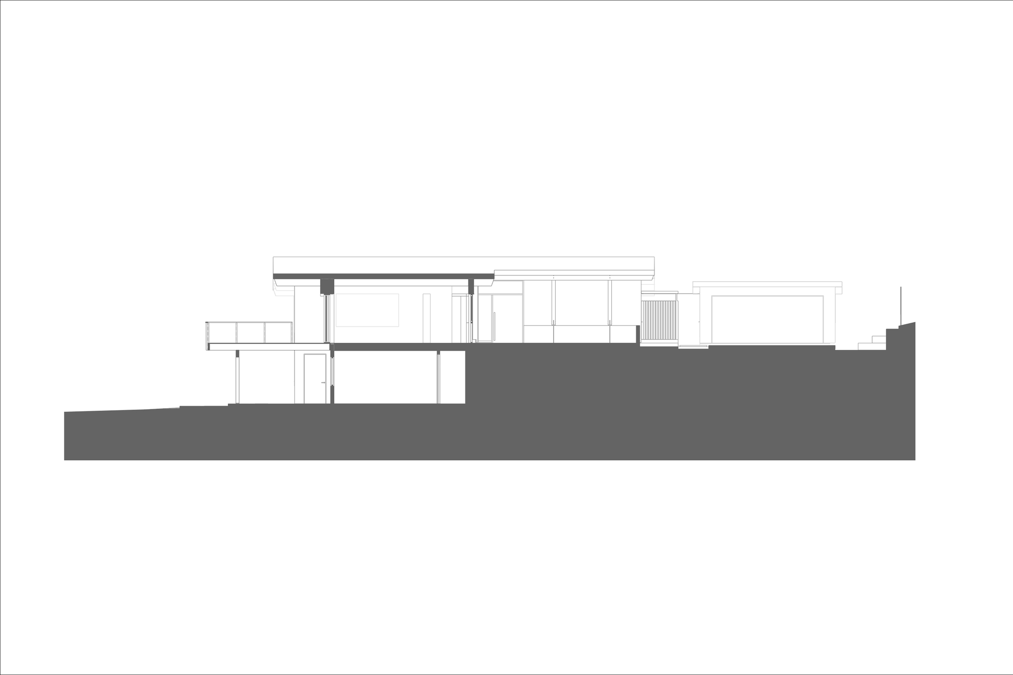 Section drawing revealing two-story interior spaces set into sloping terrain