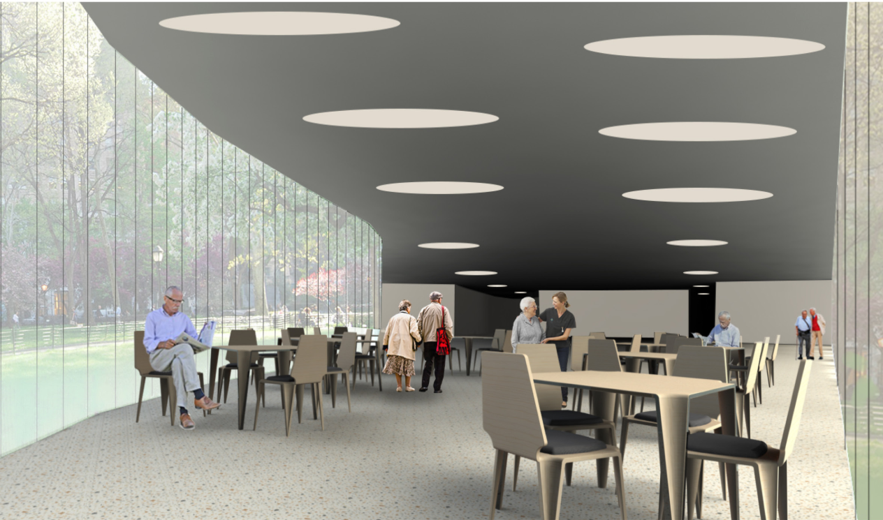 Bright communal dining space overlooking surrounding greenery.