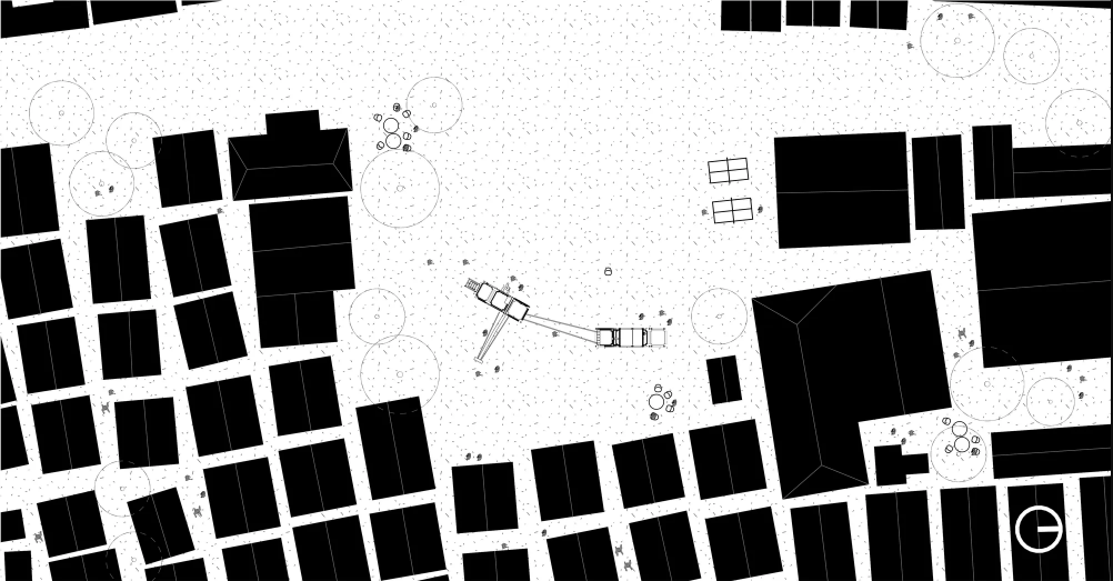 Site plan showing the playground positioned as a compact intervention within the surrounding settlement