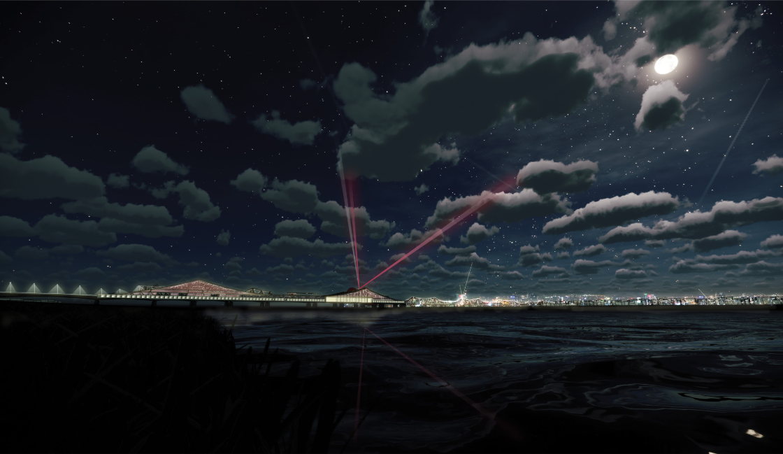 A nighttime river view transforms the bridge into a luminous urban landmark