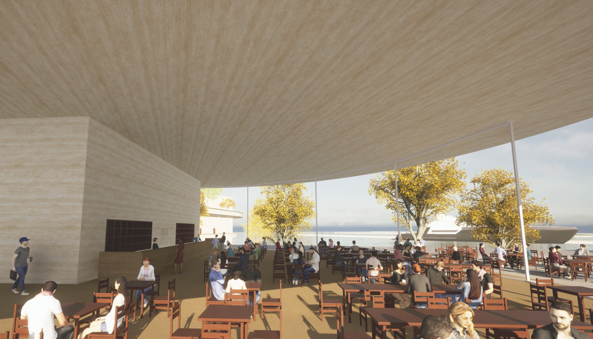 Covered terrace cafe with timber ceiling and diners seated beneath autumn trees facing the water