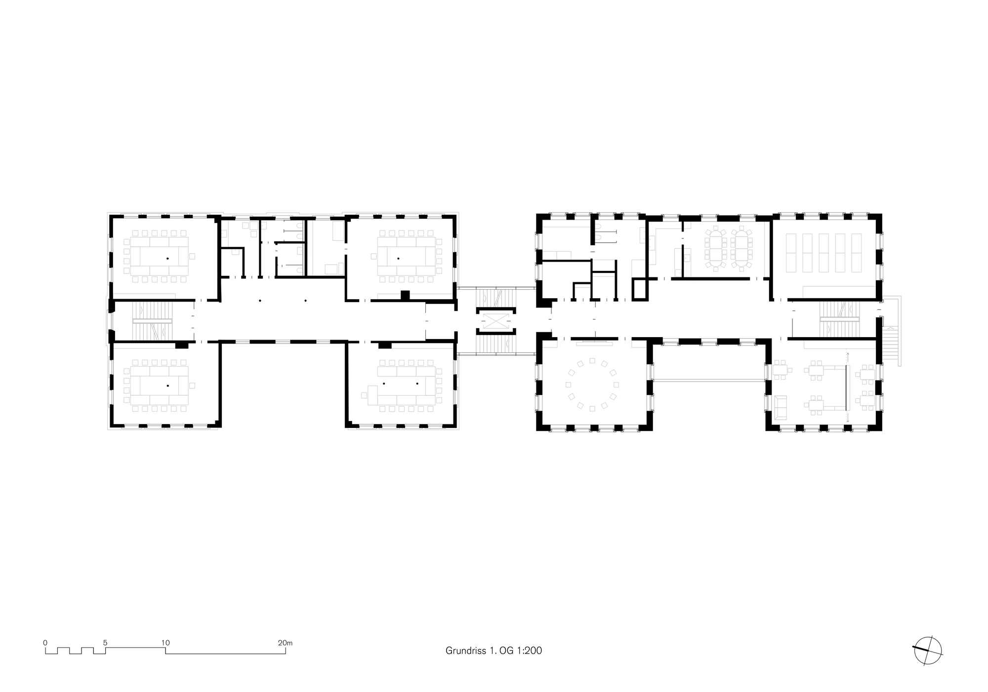 Ground floor plan showing two interconnected wings with multiple rooms and central circulation spaces
