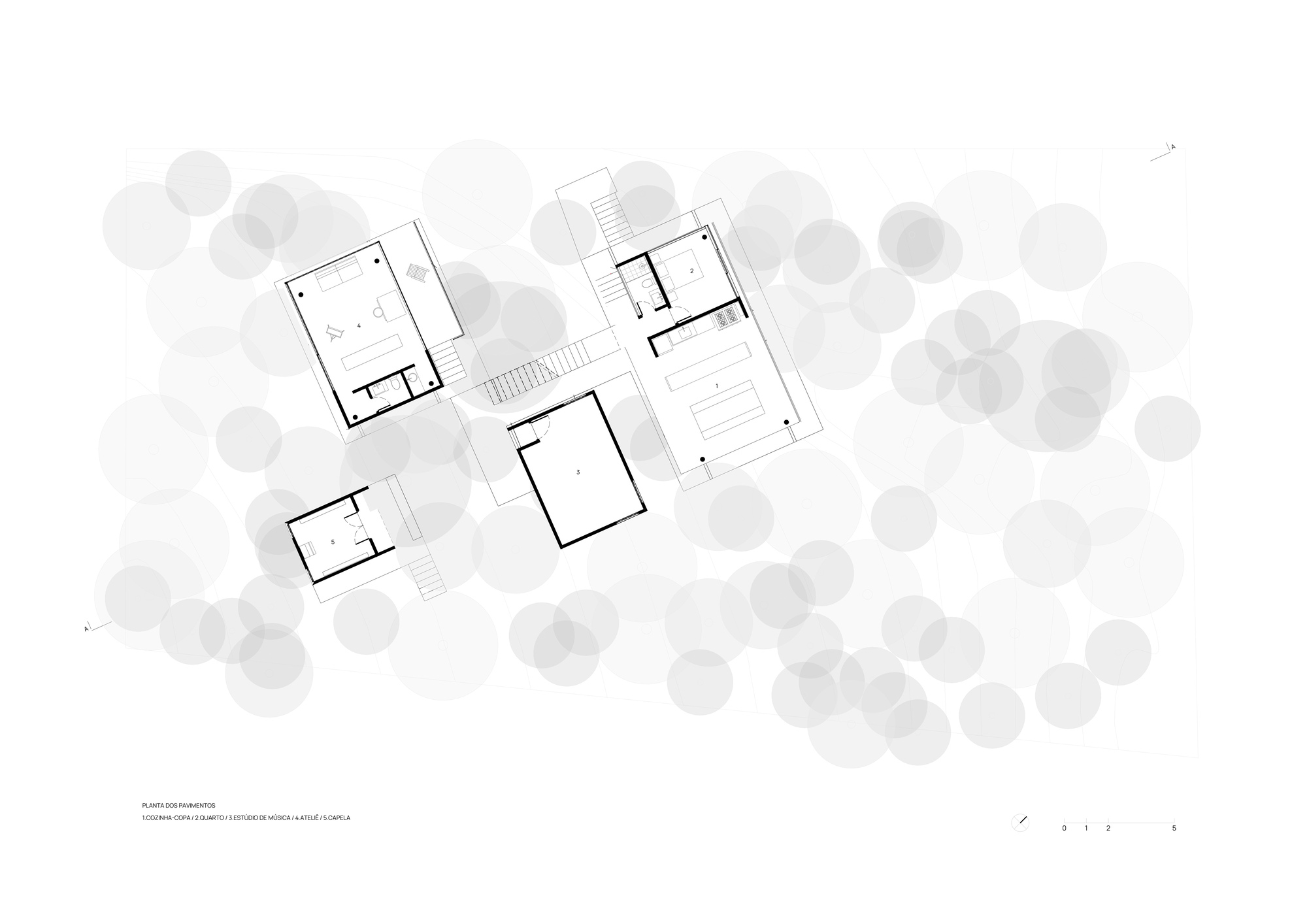 Floor plan drawing showing four rectangular volumes arranged around a central courtyard with surrounding trees