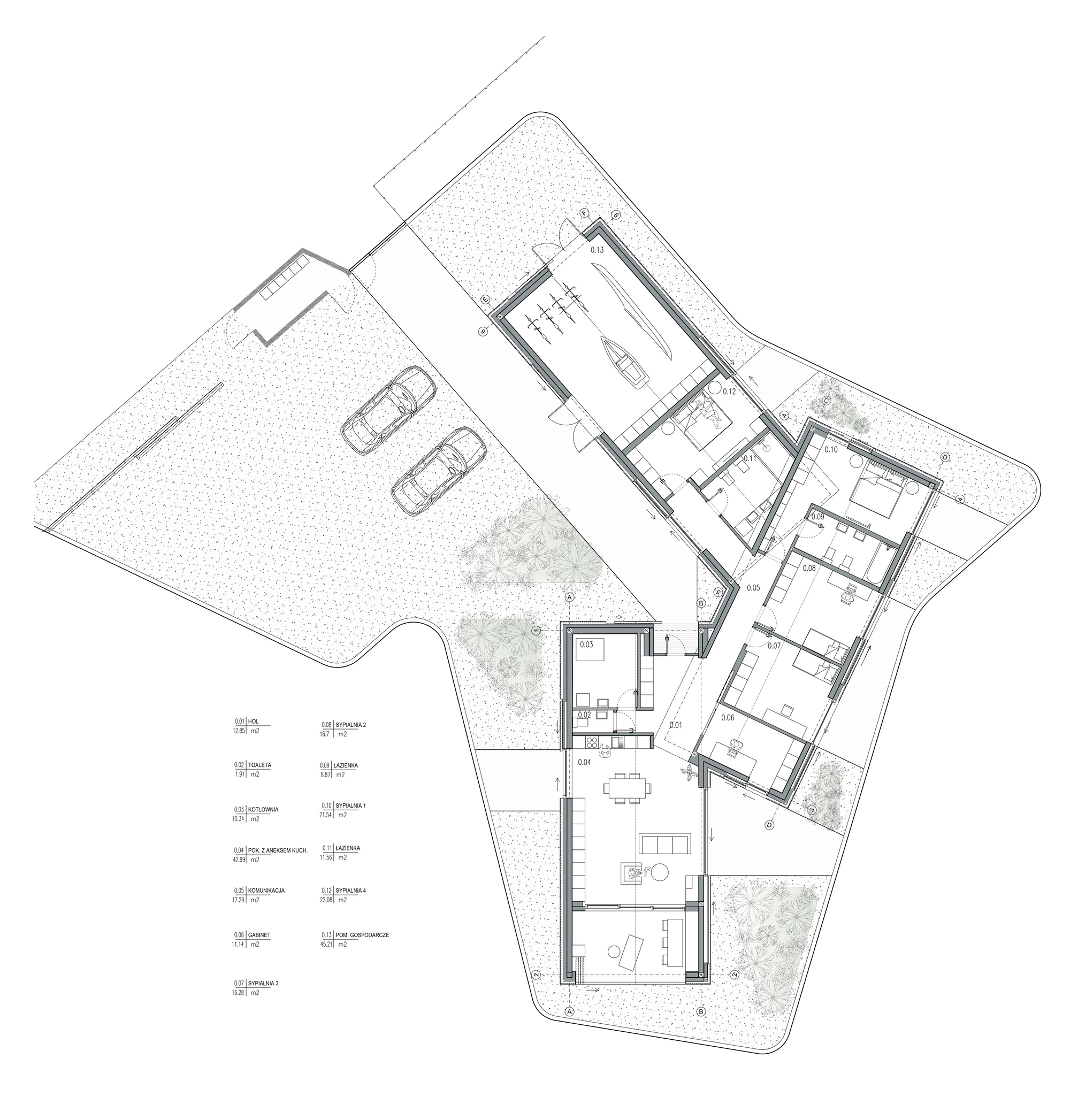 Floor plan drawing showing angled wings with courtyard and parking areas