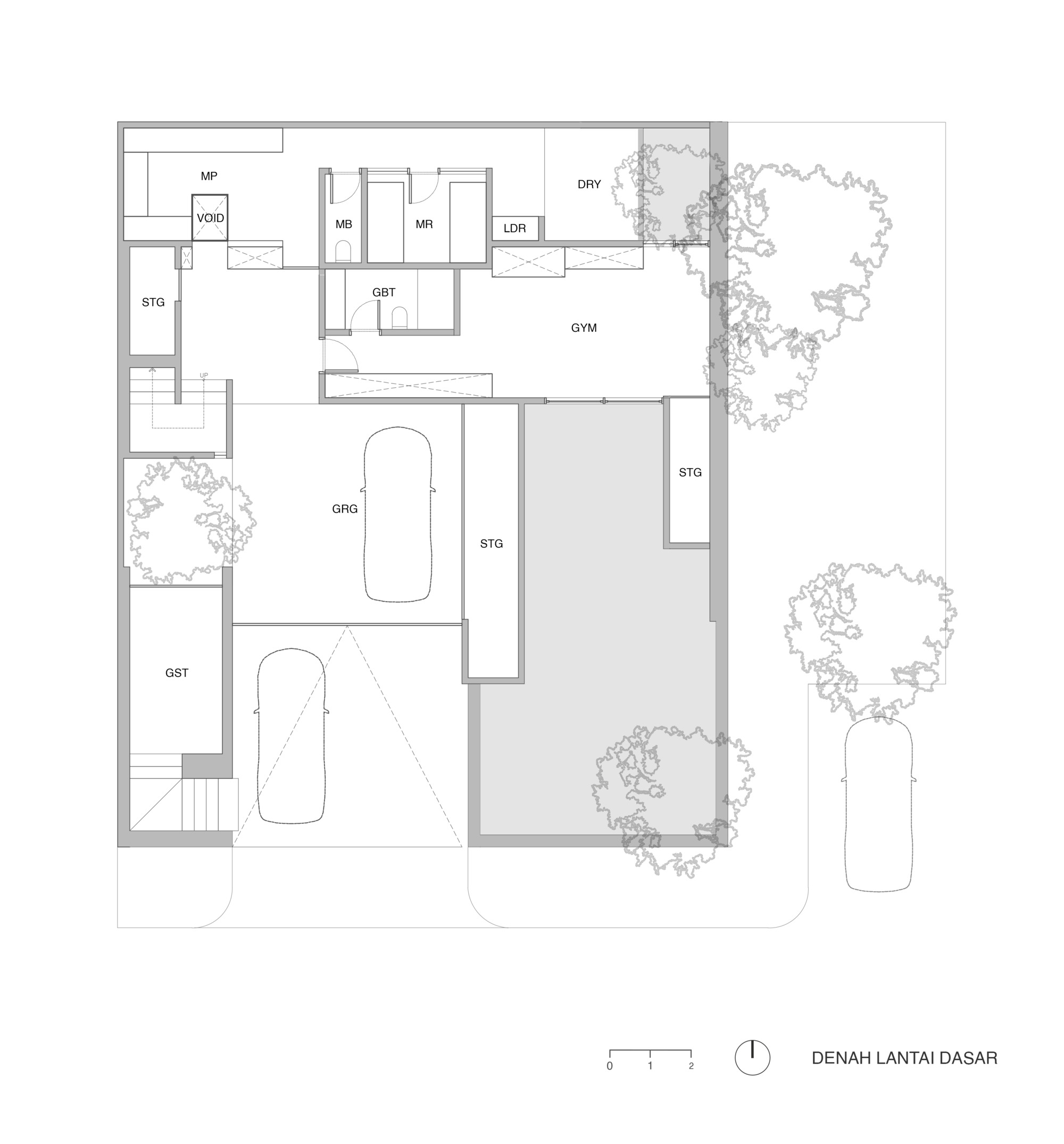 Ground floor plan showing gym and storage areas surrounding courtyards with landscaping