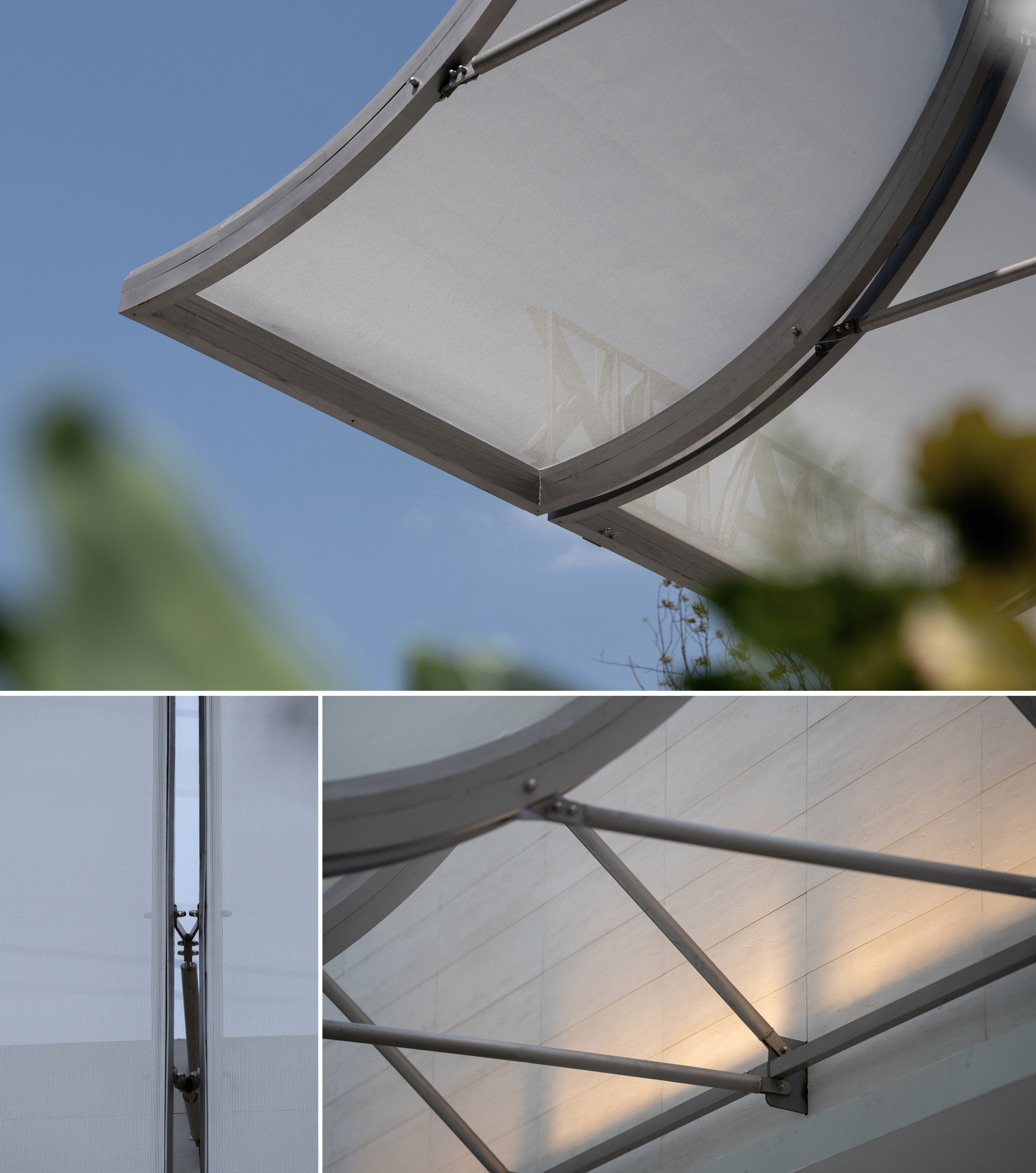 Detail of the tensioned fabric roof edge with metal frame connection and branching support structure below