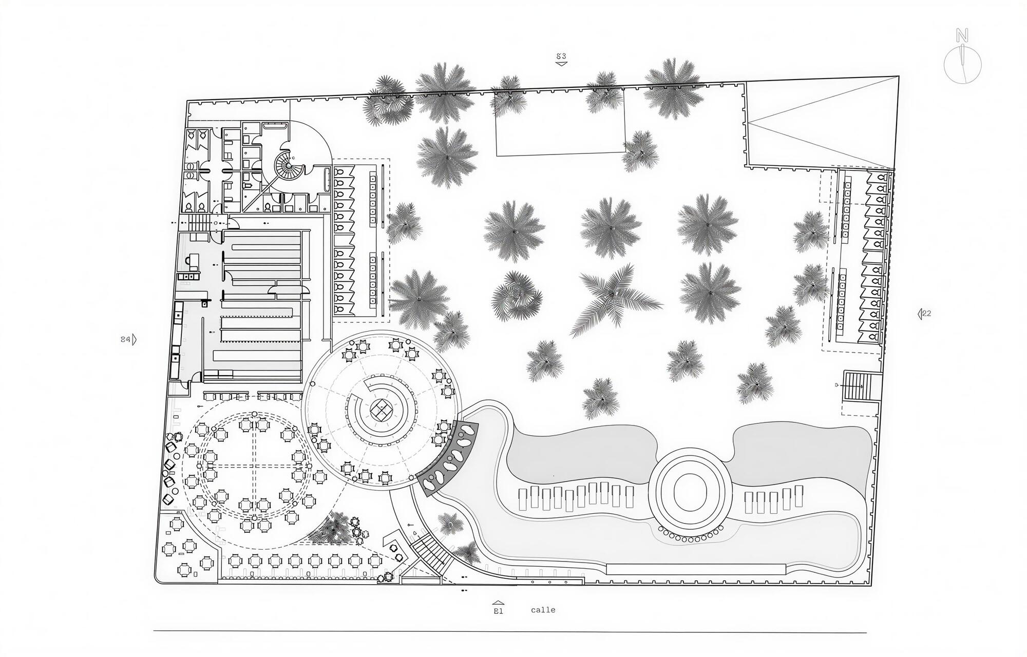 Site plan drawing showing circular dining pavilion, pool, and palm tree courtyard layout
