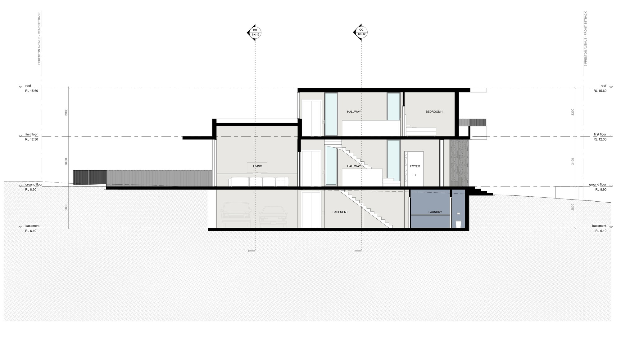 Section drawing through the split-level interior revealing bedroom, living and kitchen spaces across varying floor heights