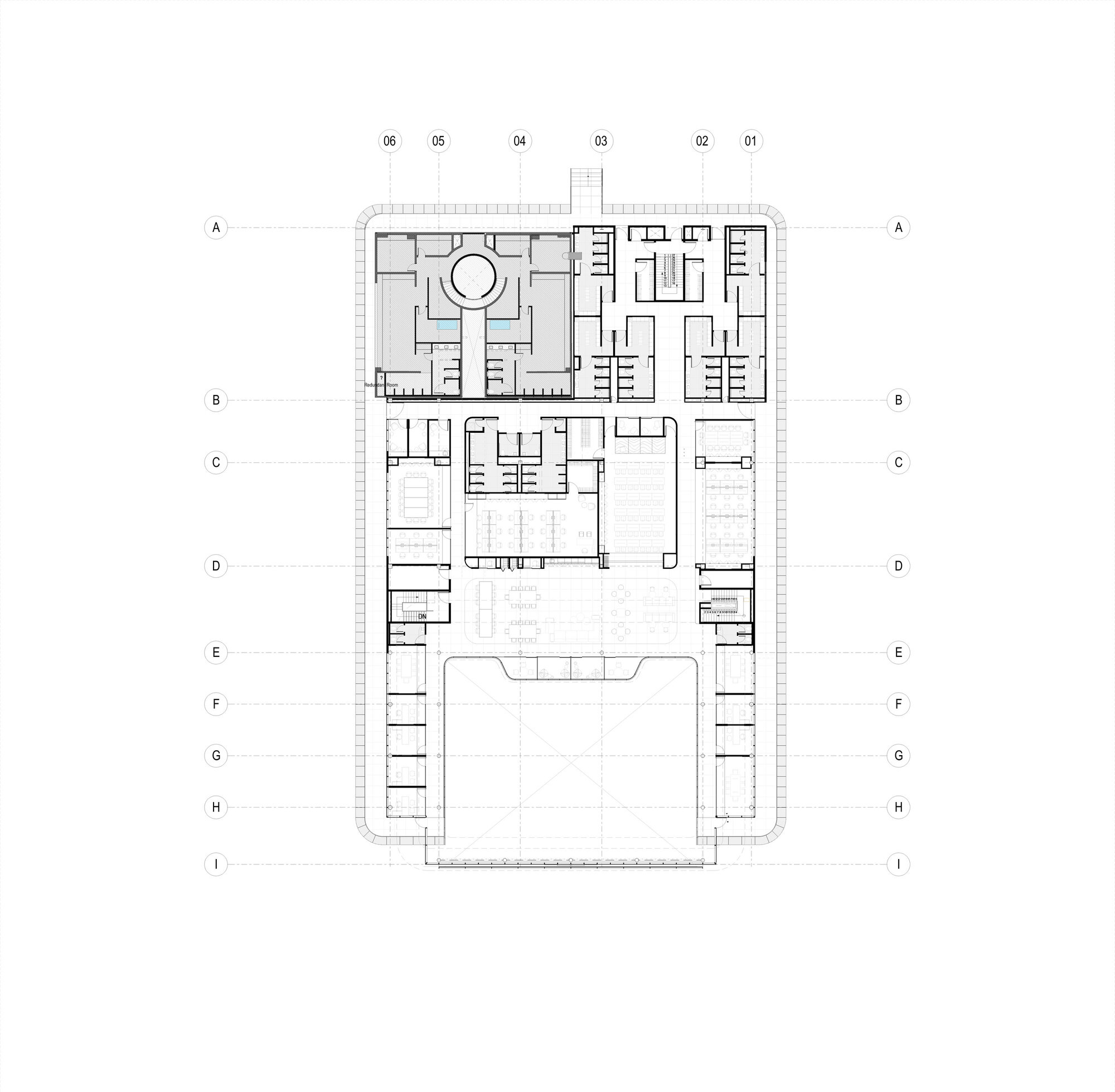 Floor plan drawing showing classrooms around circular courtyard with central pool and outdoor playing court below