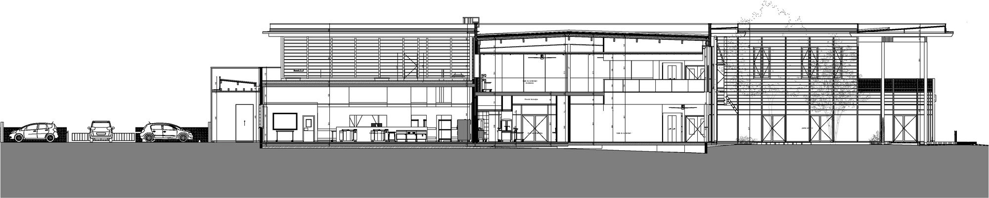 Section drawing illustrating a two-story interior with exposed structure and horizontal timber screening elements