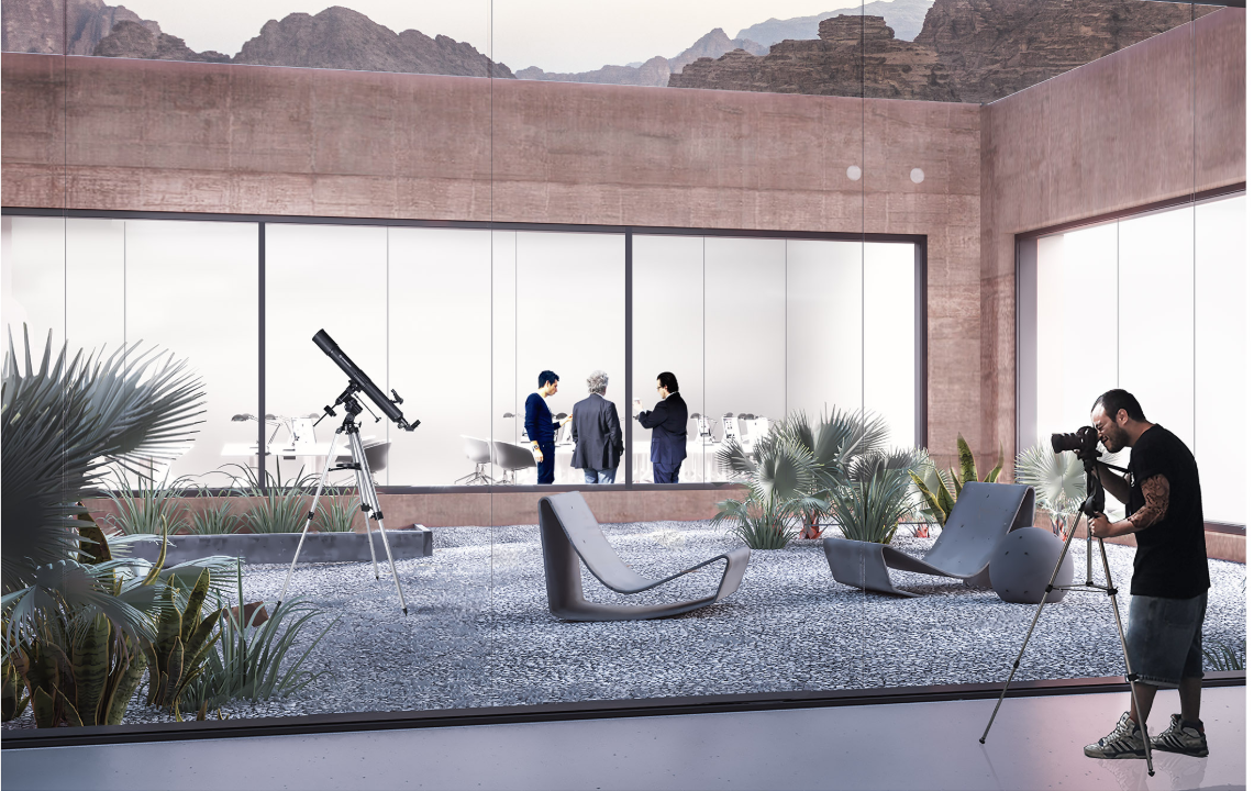 Sunken courtyard bringing daylight, vegetation, and views into the research complex.