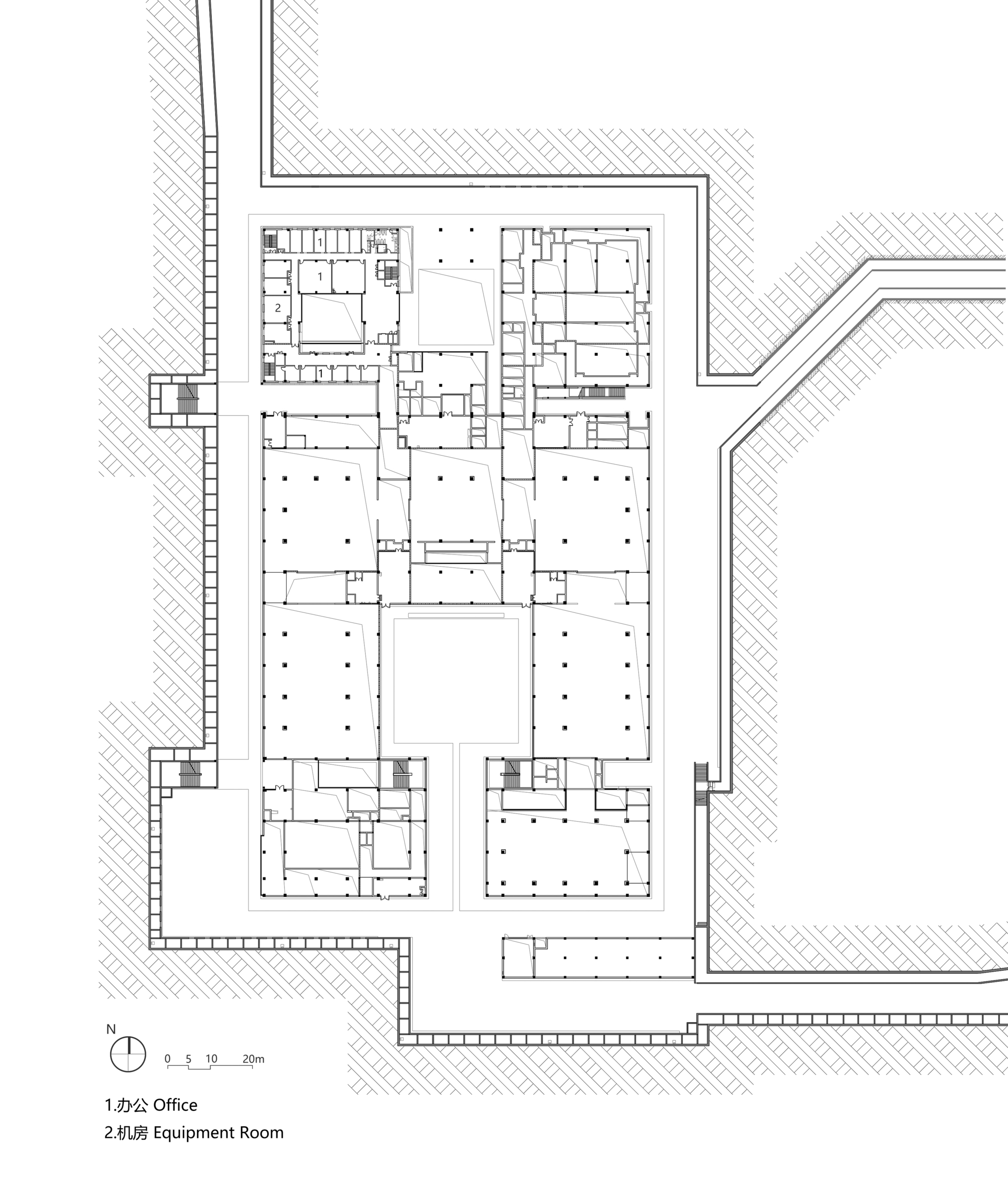 Floor plan drawing showing office spaces and equipment rooms arranged around central courtyards