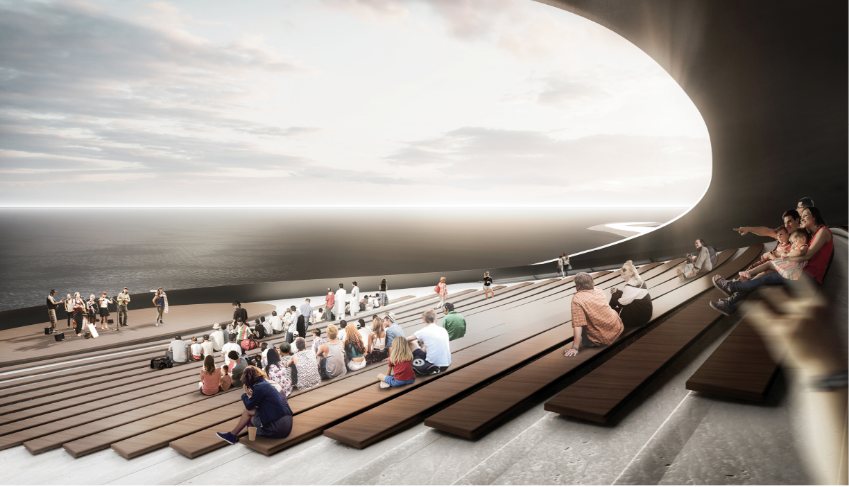 Wide stepped seating area beneath the sweeping roof opening to ocean views with audience gathered