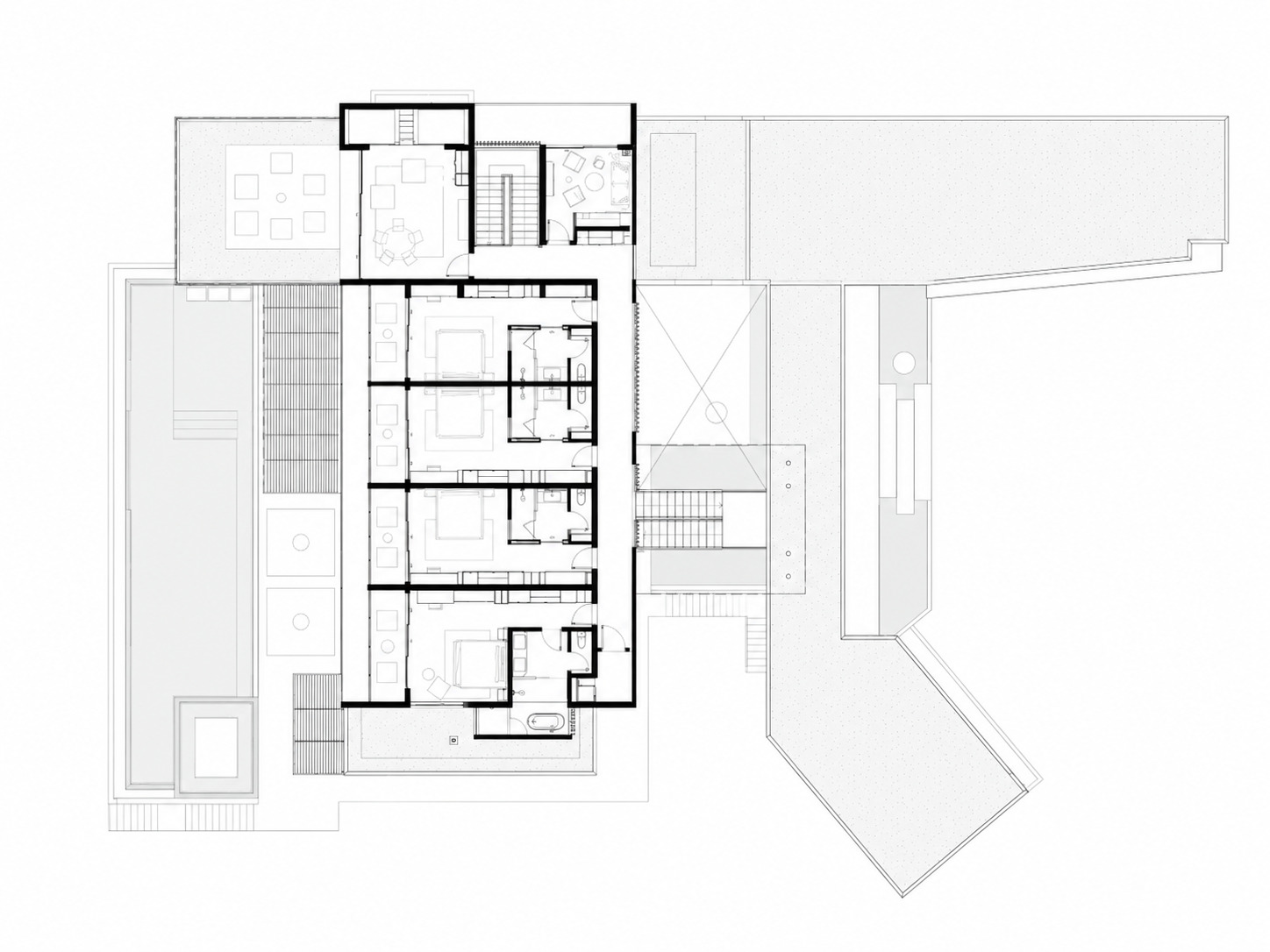 Upper floor plan drawing showing bedroom suites arranged along a corridor with outdoor terrace