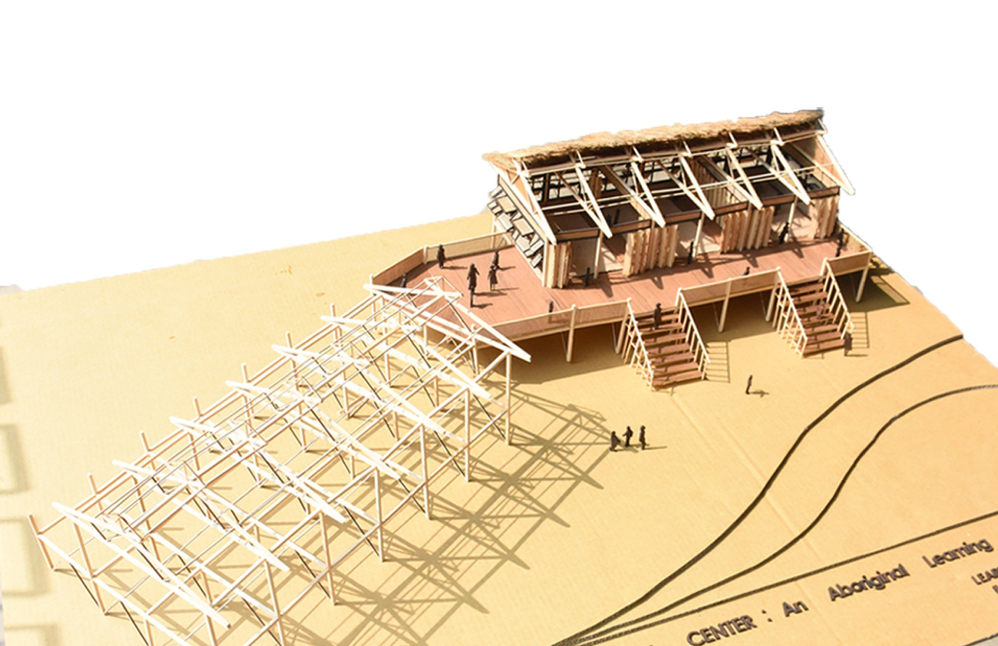 Physical model demonstrating the raised structure, modular frame, and terrain-responsive architecture.