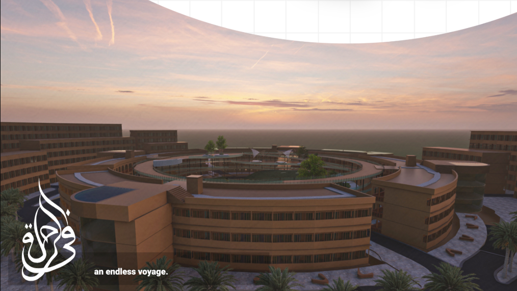 Sunset view highlighting the curved residential blocks arranged around the central riad.