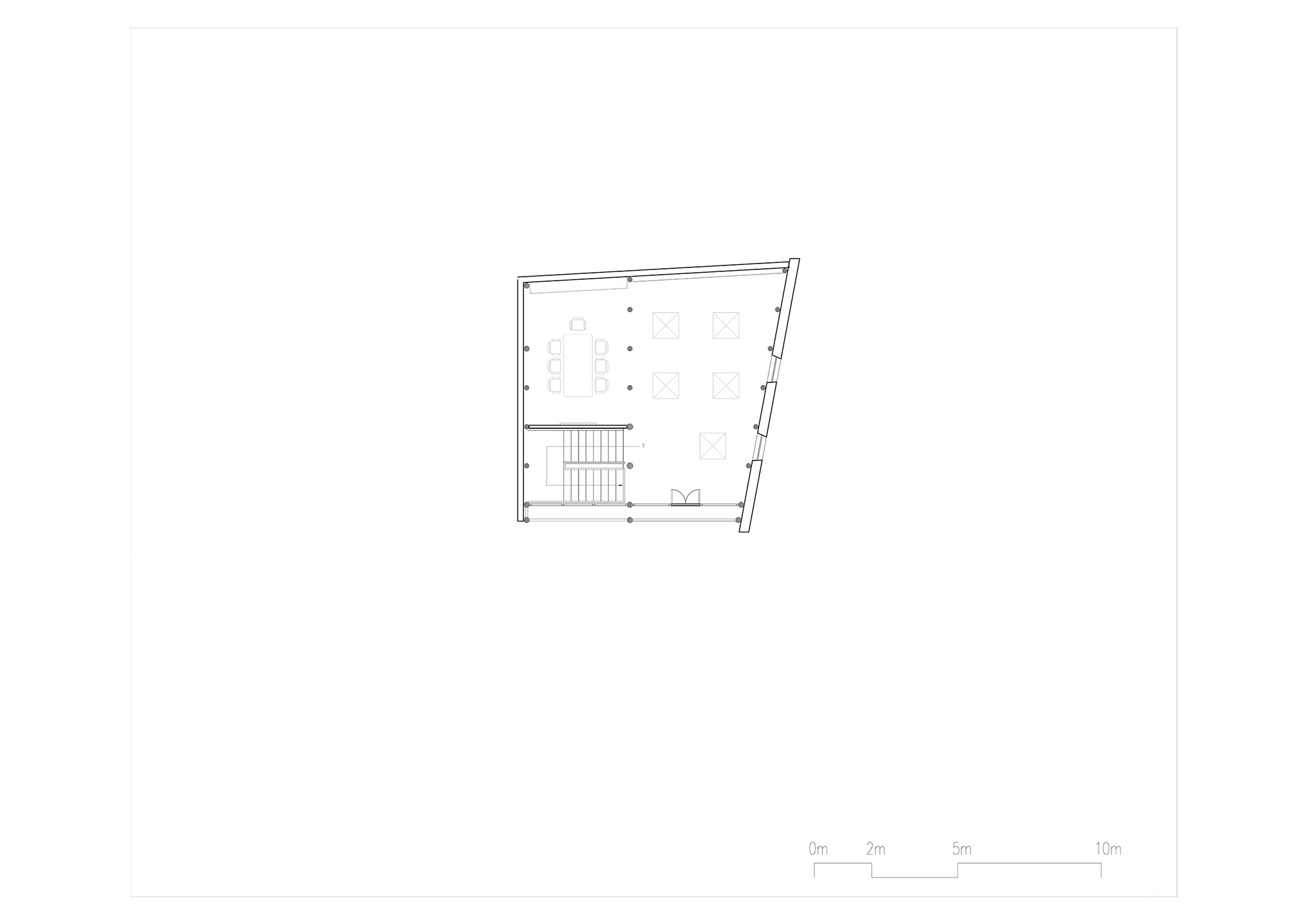 Floor plan drawing showing a trapezoidal volume with central staircase and distributed workspaces
