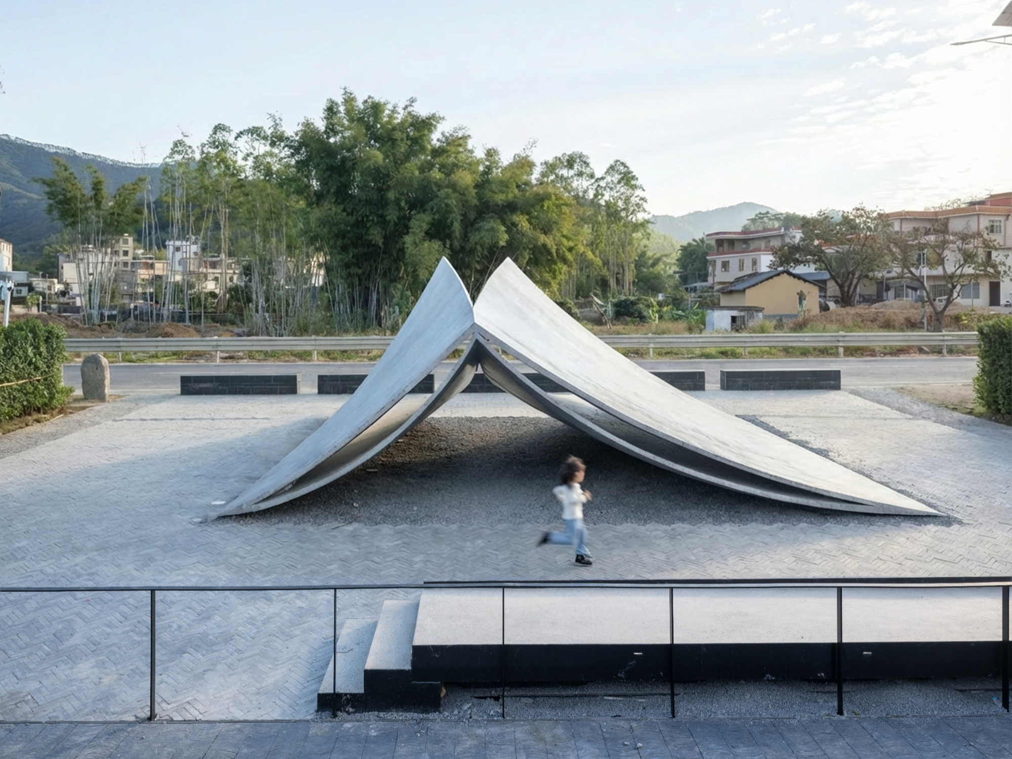 Angular concrete roof structure with folded planes above a plaza with a person walking at dusk