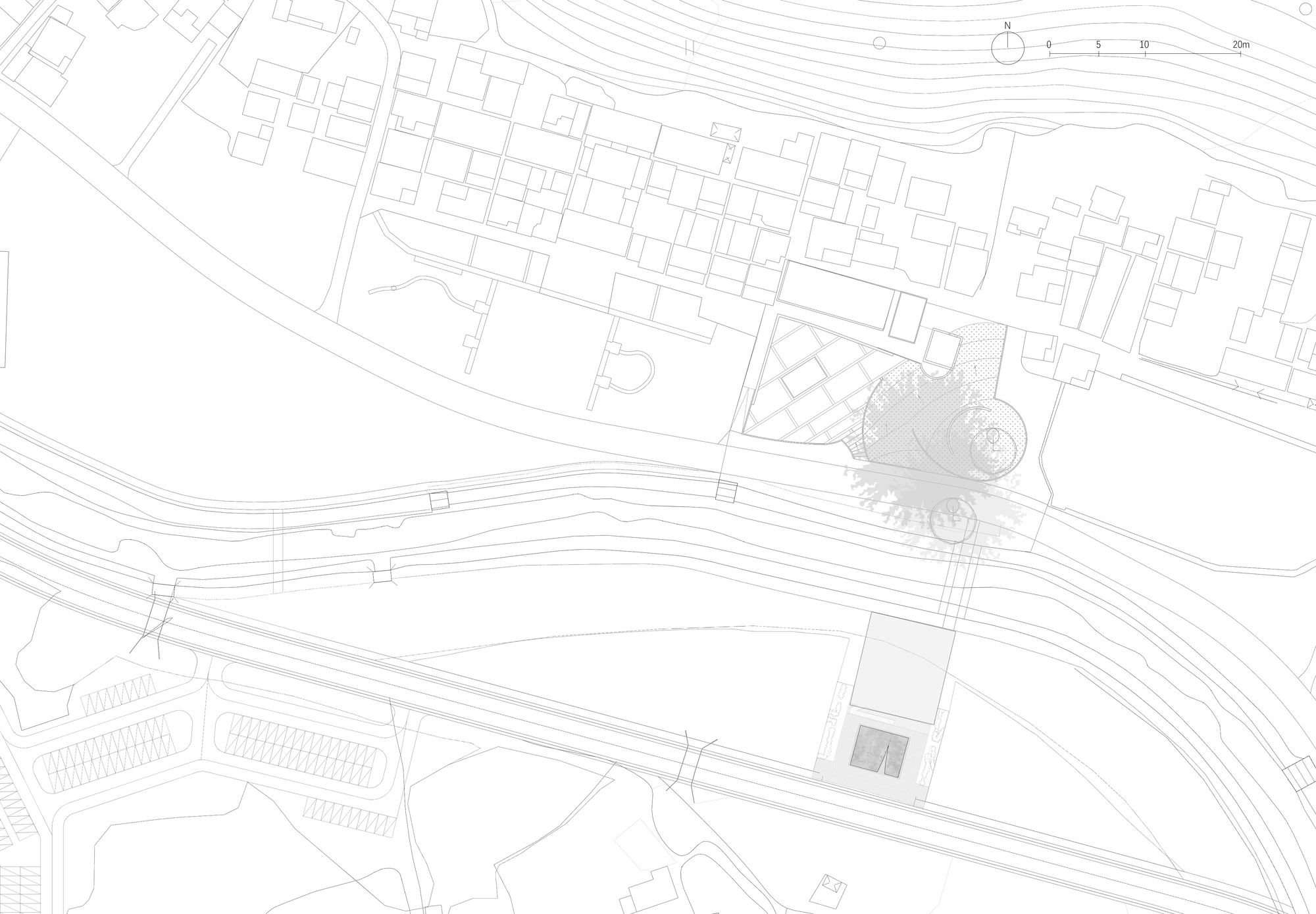 Site plan drawing showing the building footprint within the surrounding street grid and topography